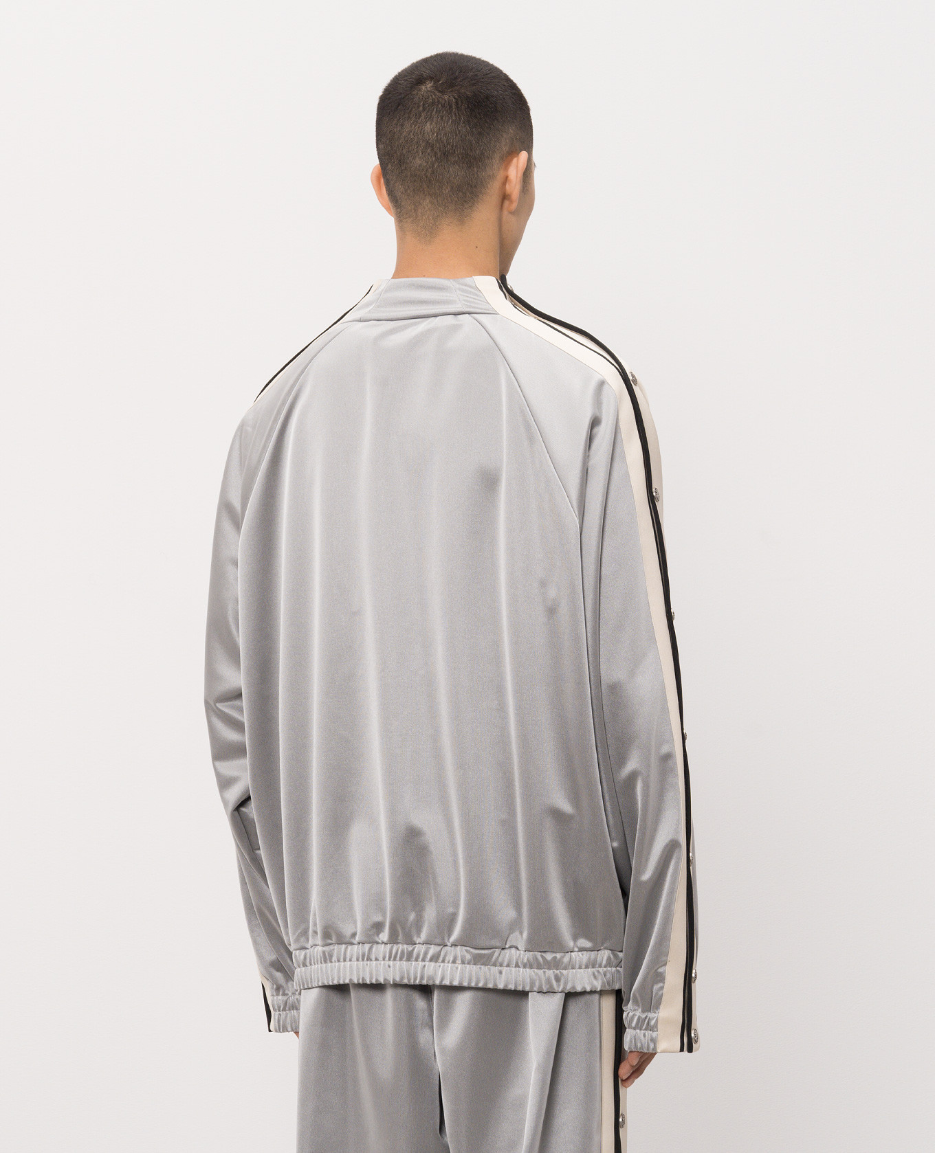 Grey sports jacket with logo print Palm Angels
Grey sports jacket with logo print Palm Angels