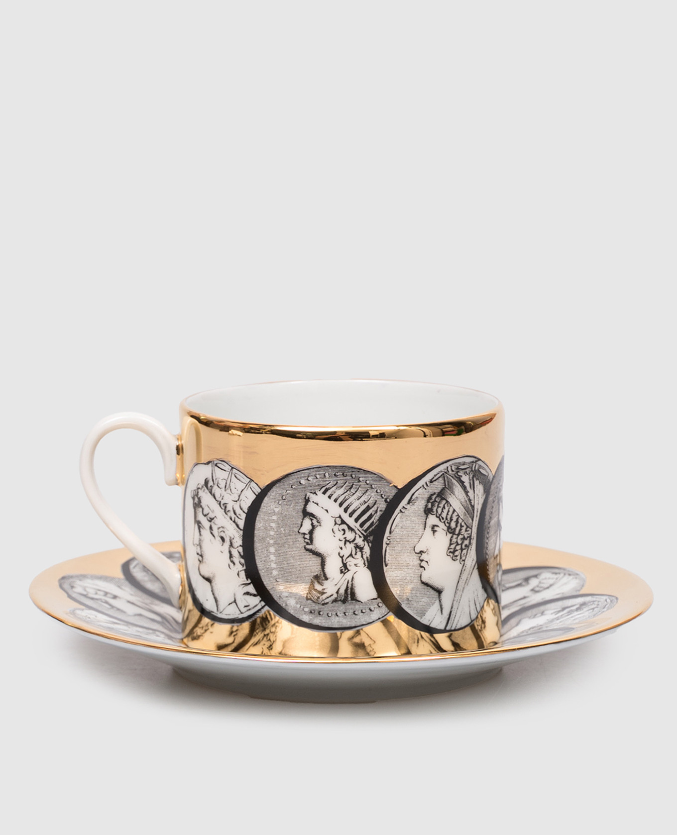 Cammei porcelain tea cup and saucer Fornasetti, Golden
Cammei porcelain tea cup and saucer Fornasetti, Golden