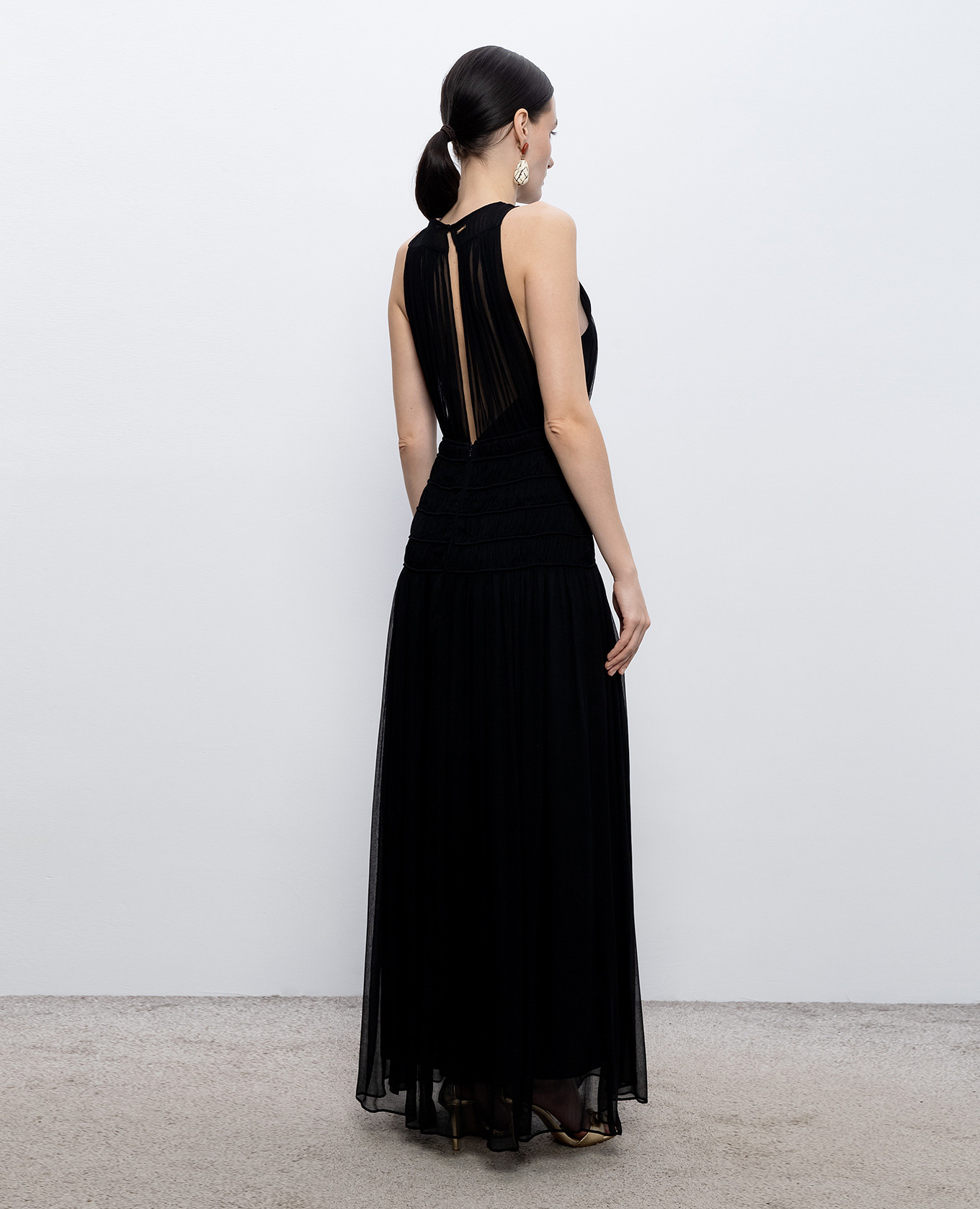 Black maxi dress with drape Twinset
Black maxi dress with drape Twinset