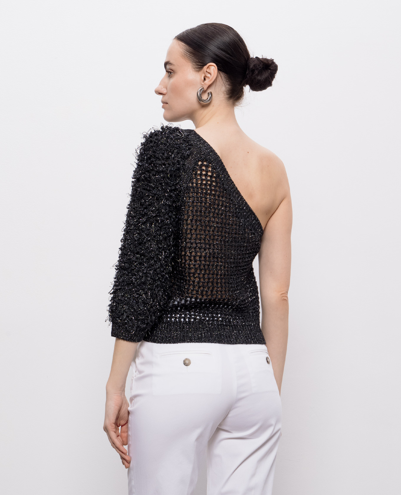 Black openwork lurex top with an open shoulder Peserico
Black openwork lurex top with an open shoulder Peserico