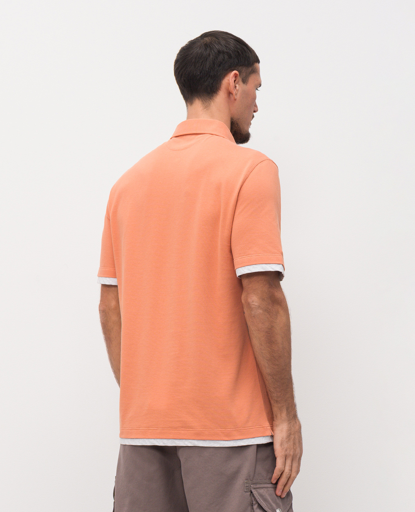 Orange polo Brunello Cucinelli
Orange polo Brunello Cucinelli