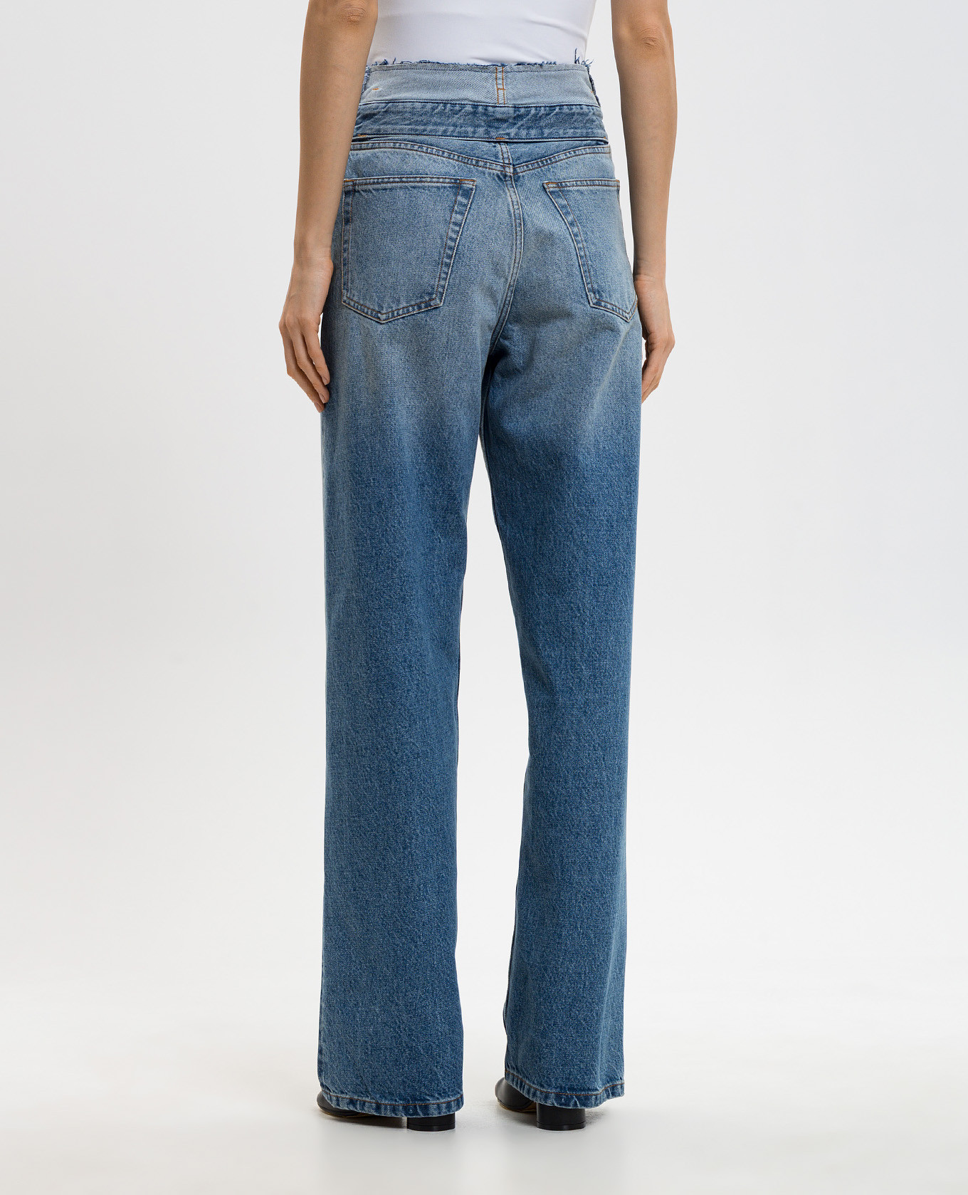 Blue jeans with a worn effect Maison Margiela MM6
Blue jeans with a worn effect Maison Margiela MM6