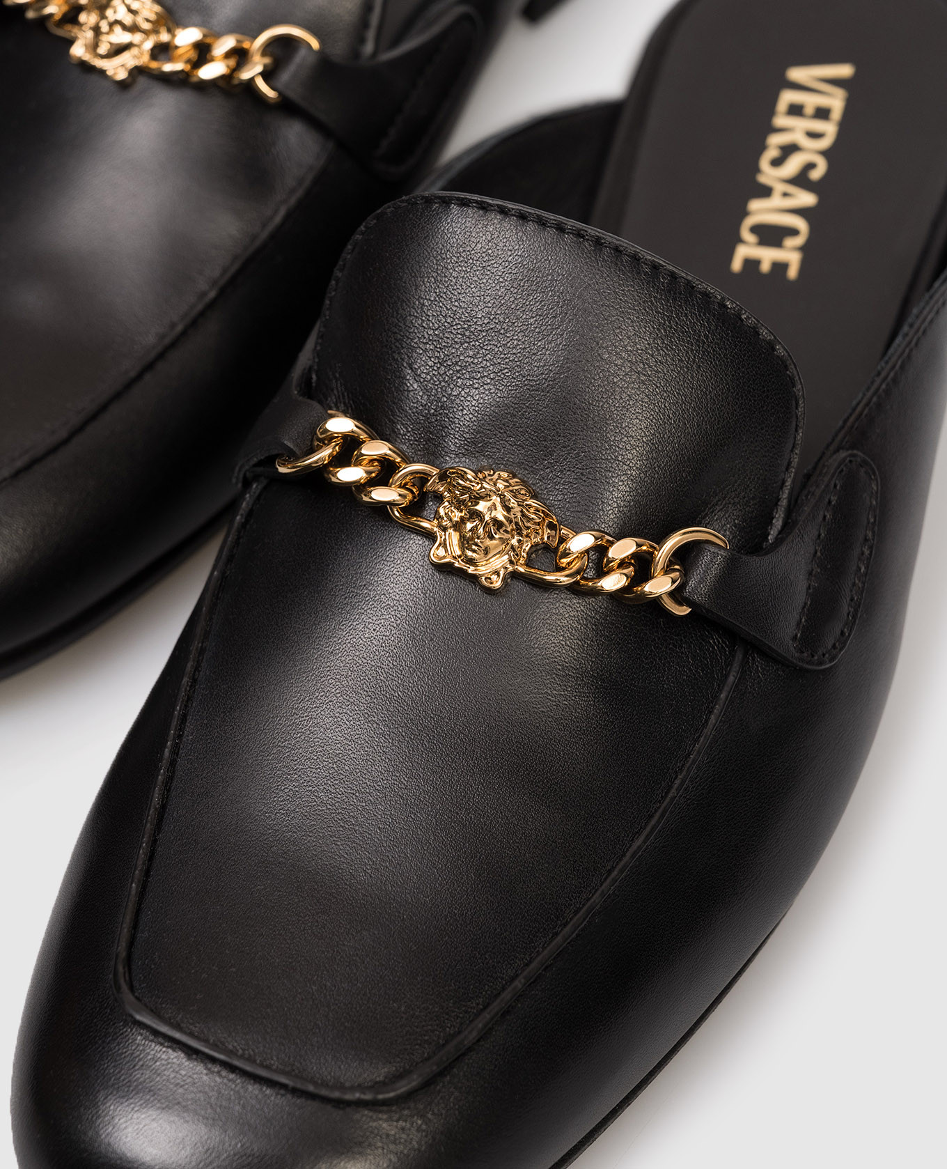 Black Medusa leather mules Versace
Black Medusa leather mules Versace