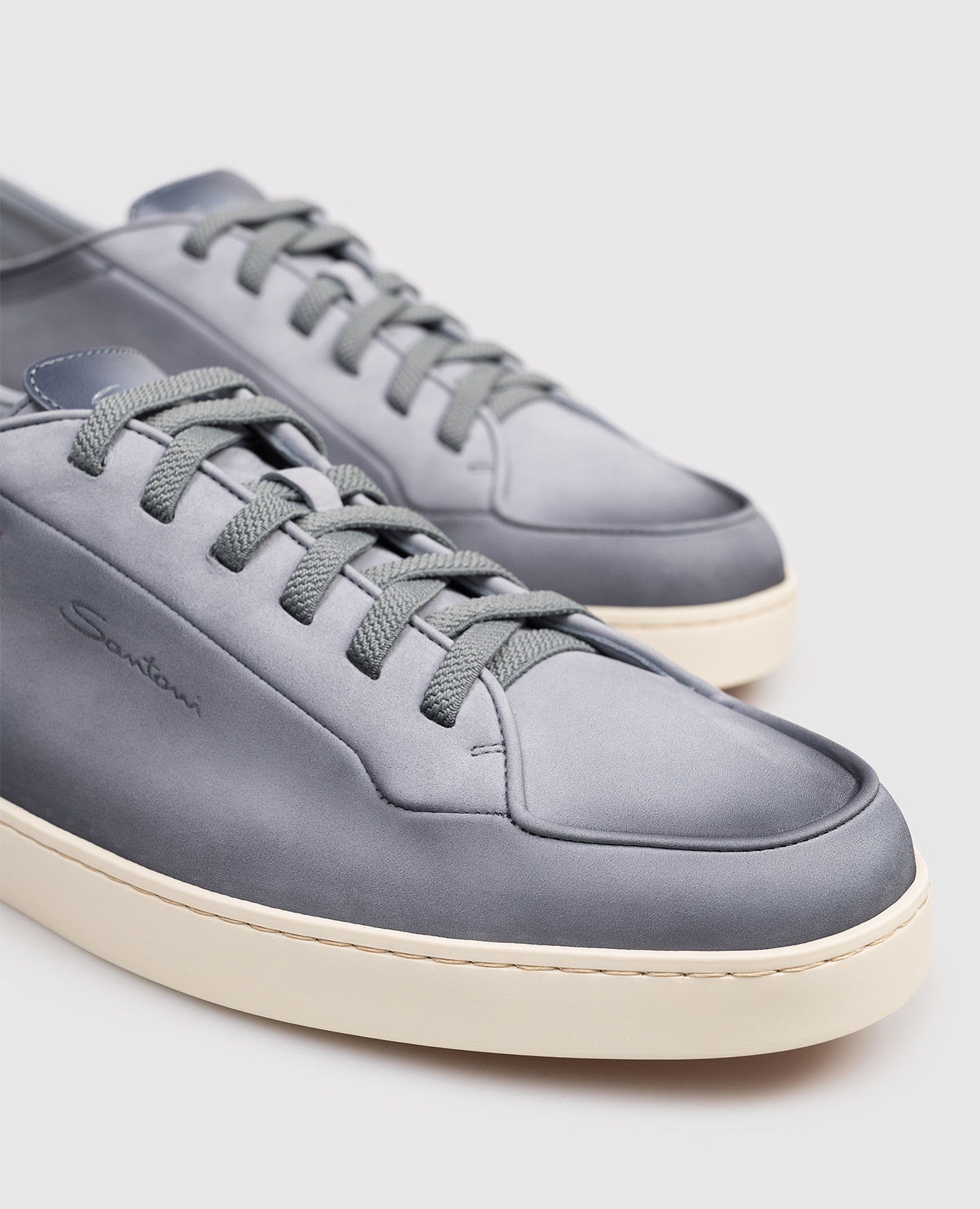 Blue nubuck sneakers with gradient effect Santoni
Blue nubuck sneakers with gradient effect Santoni