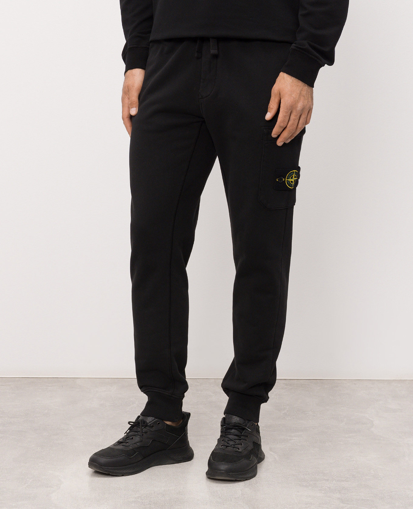 Black joggers with logo patch Stone Island
Black joggers with logo patch Stone Island