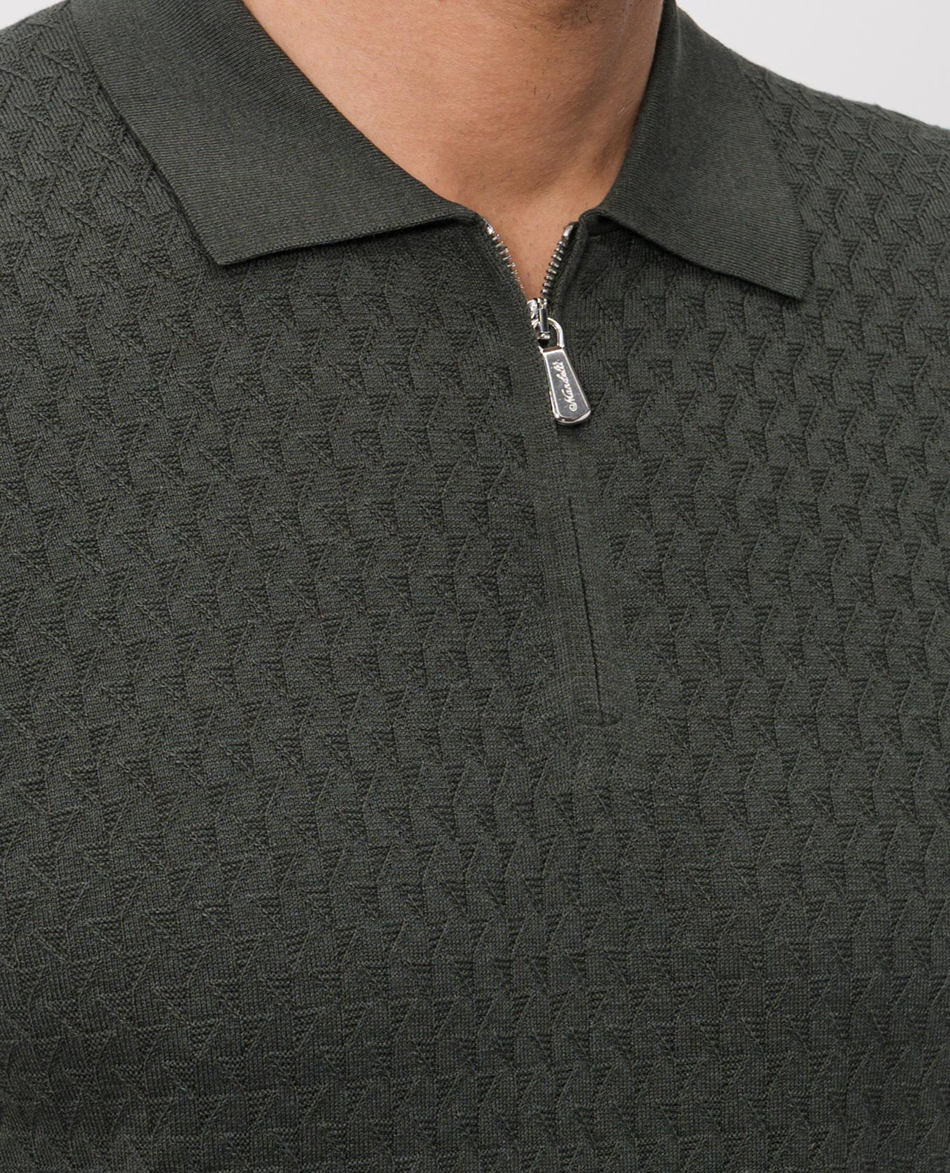 Green silk polo with geometric pattern Enrico Mandelli
Green silk polo with geometric pattern Enrico Mandelli