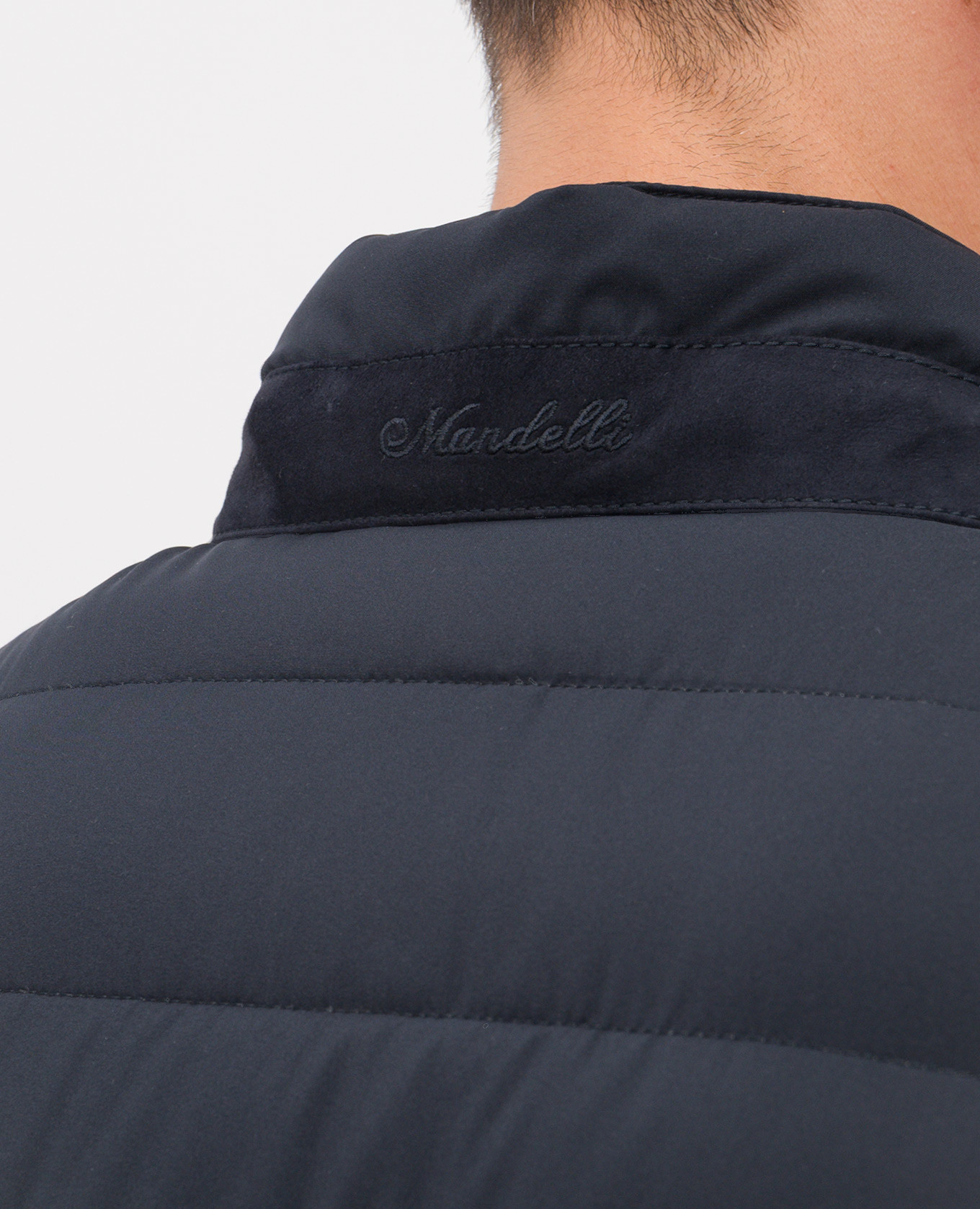 Blue down quilted vest Enrico Mandelli
Blue down quilted vest Enrico Mandelli