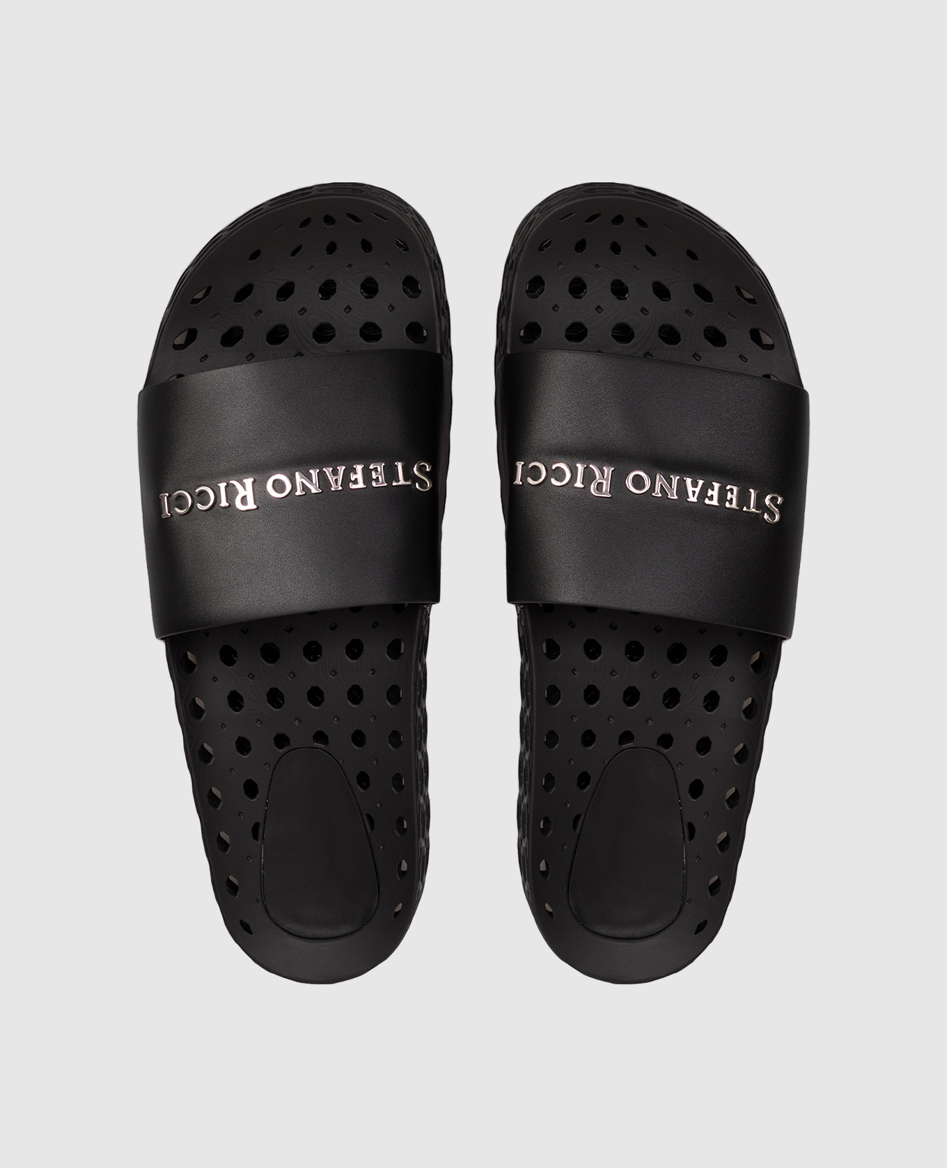 Black perforated sliders with textured logo Stefano Ricci
Black perforated sliders with textured logo Stefano Ricci