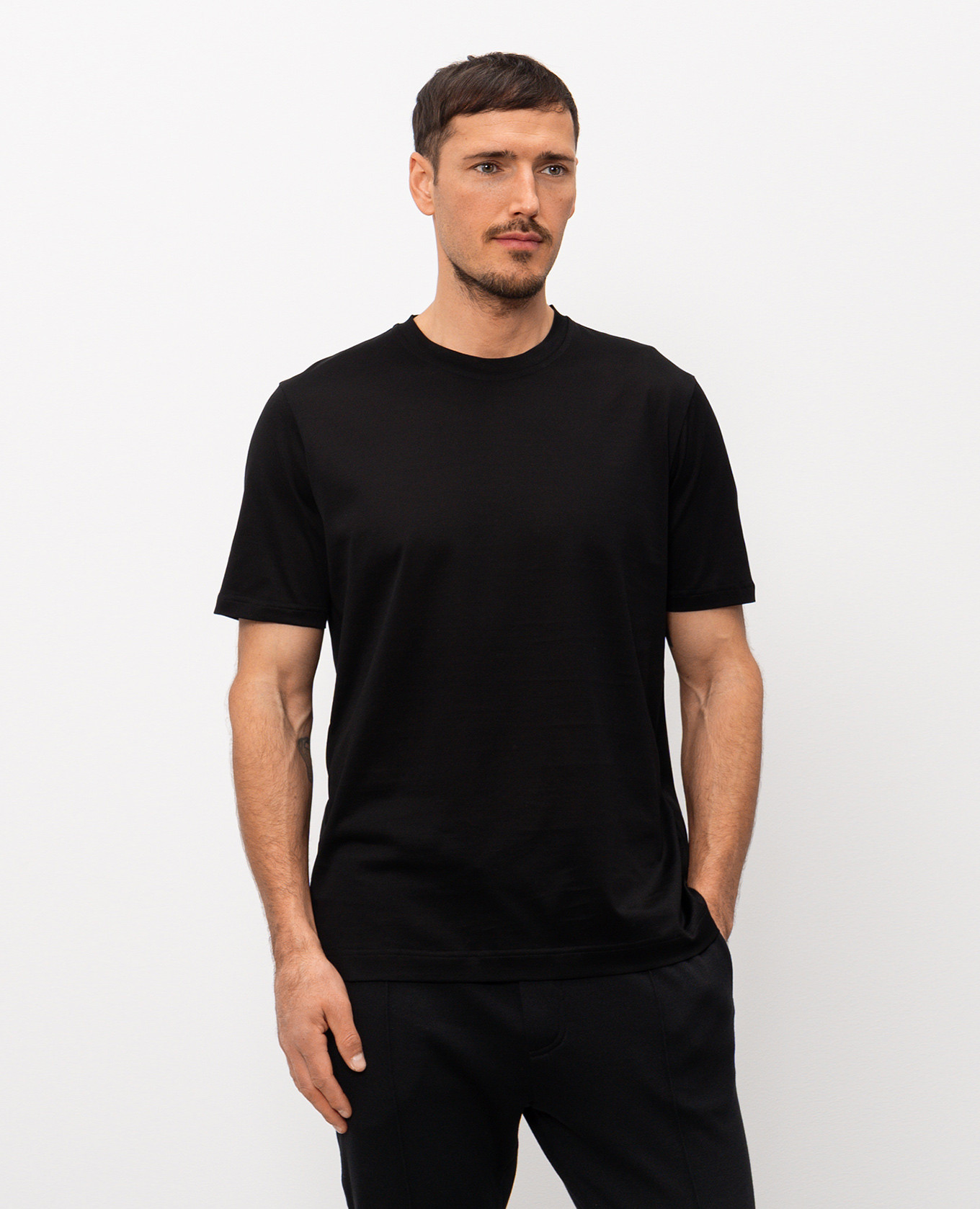Black T-shirt with logo patch CAPOBIANCO
Black T-shirt with logo patch CAPOBIANCO