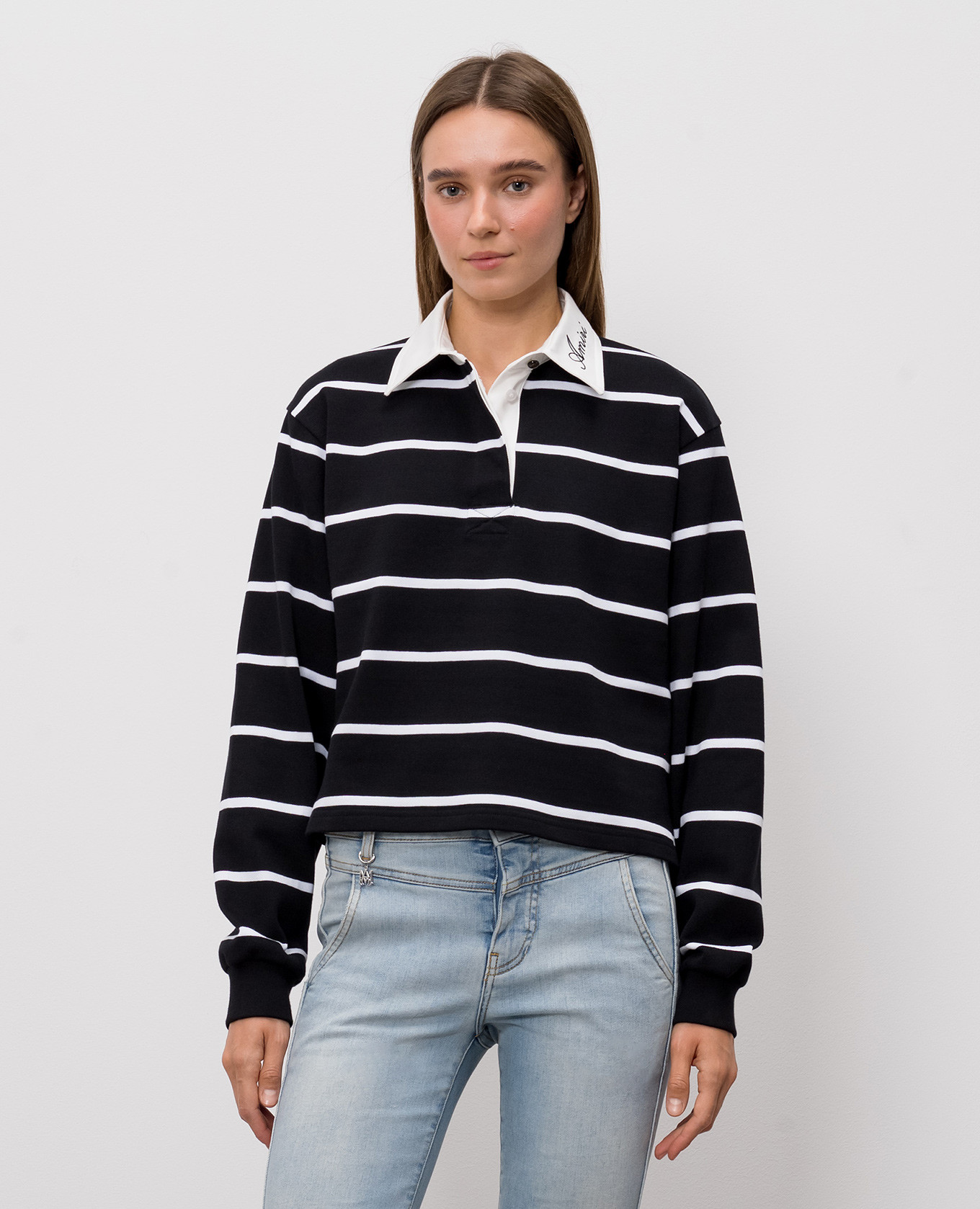 Black striped polo shirt with embroidered logo AMIRI
Black striped polo shirt with embroidered logo AMIRI