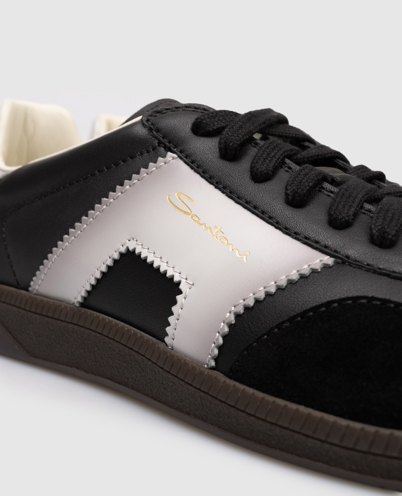 Black combination sneakers with logo Santoni
Black combination sneakers with logo Santoni