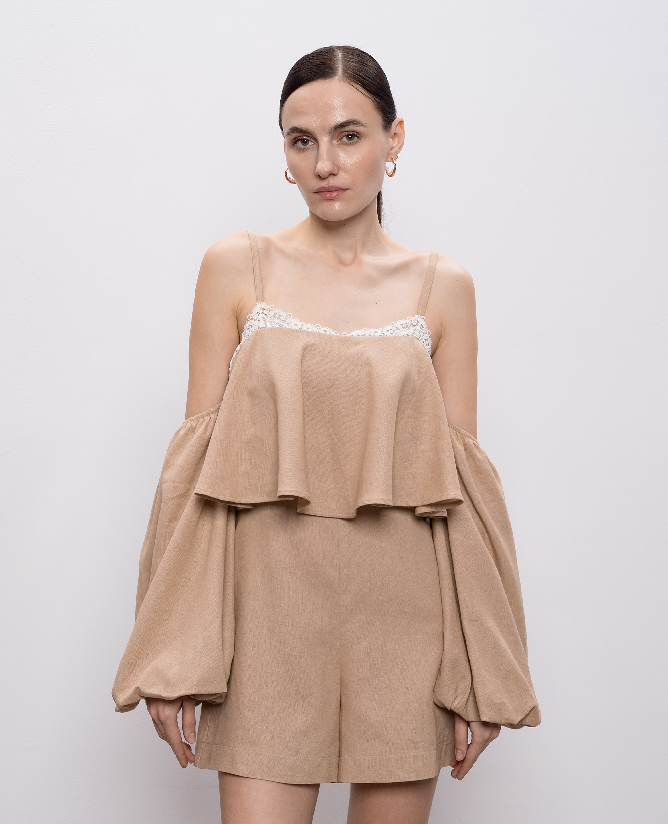 Beige linen jumpsuit with removable sleeves Twinset
Beige linen jumpsuit with removable sleeves Twinset