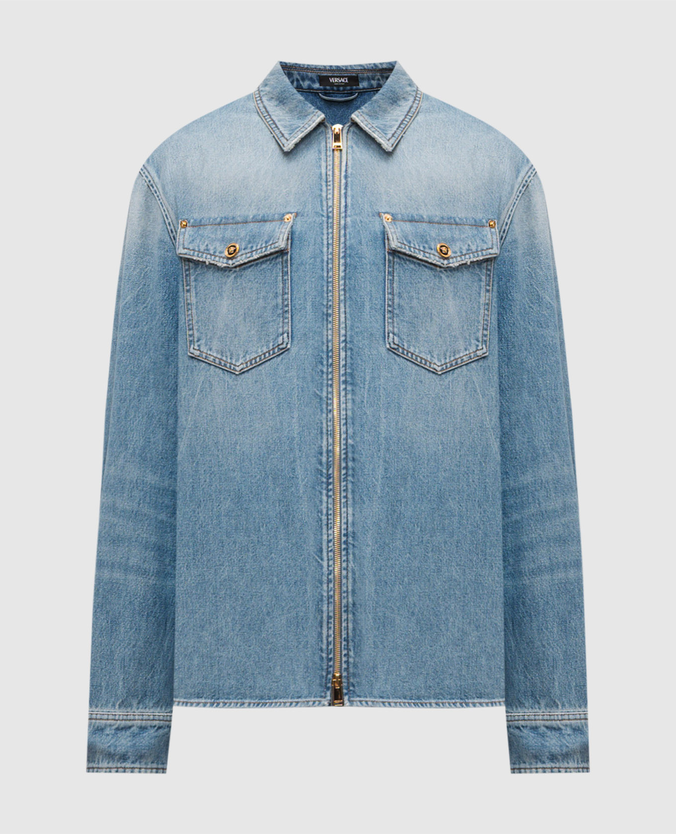 Blue denim shirt with a worn effect Versace, Light blue
Blue denim shirt with a worn effect Versace, Light blue