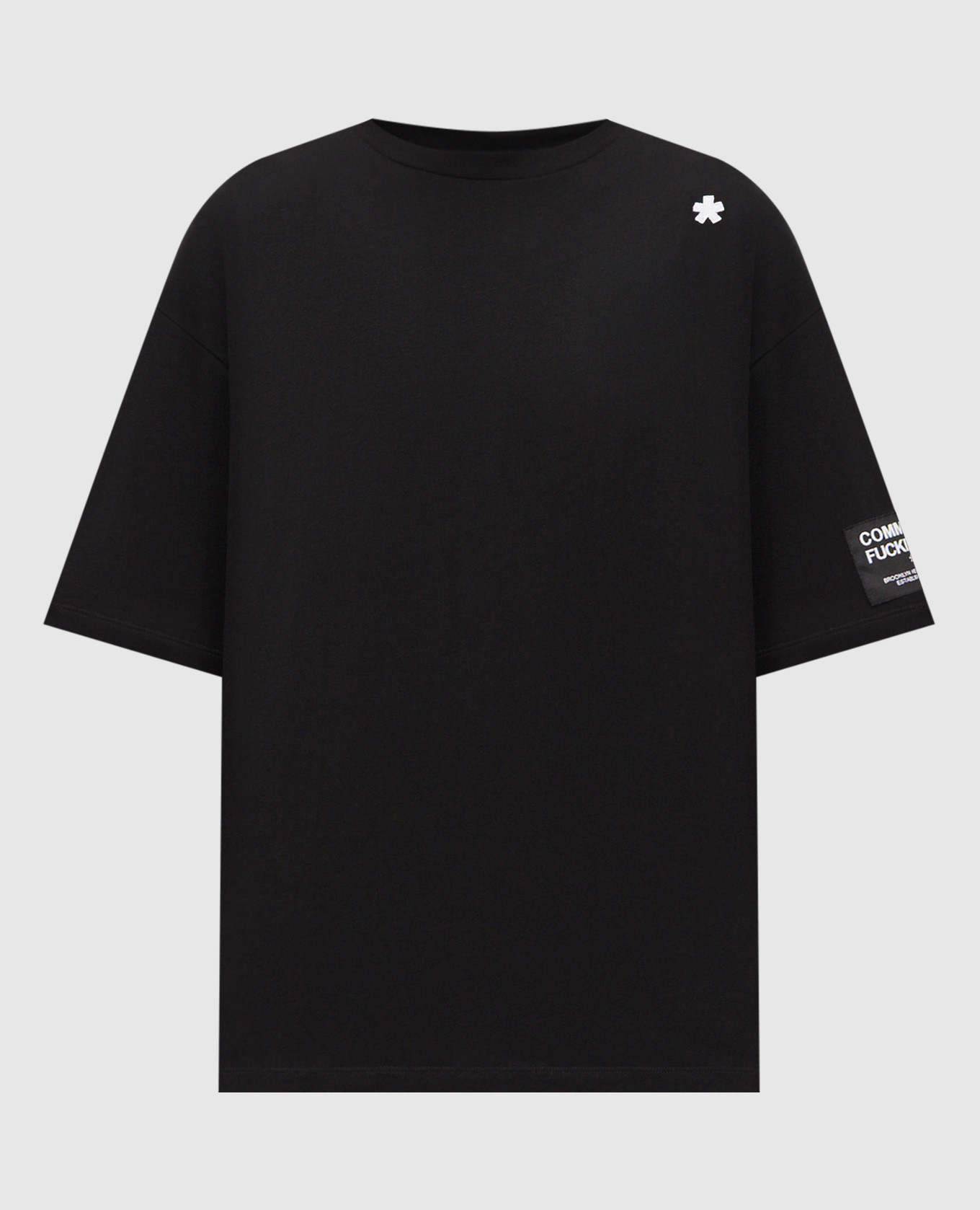 Black T-shirt with embroidered emblem Comme des Fuckdown
Black T-shirt with embroidered emblem Comme des Fuckdown