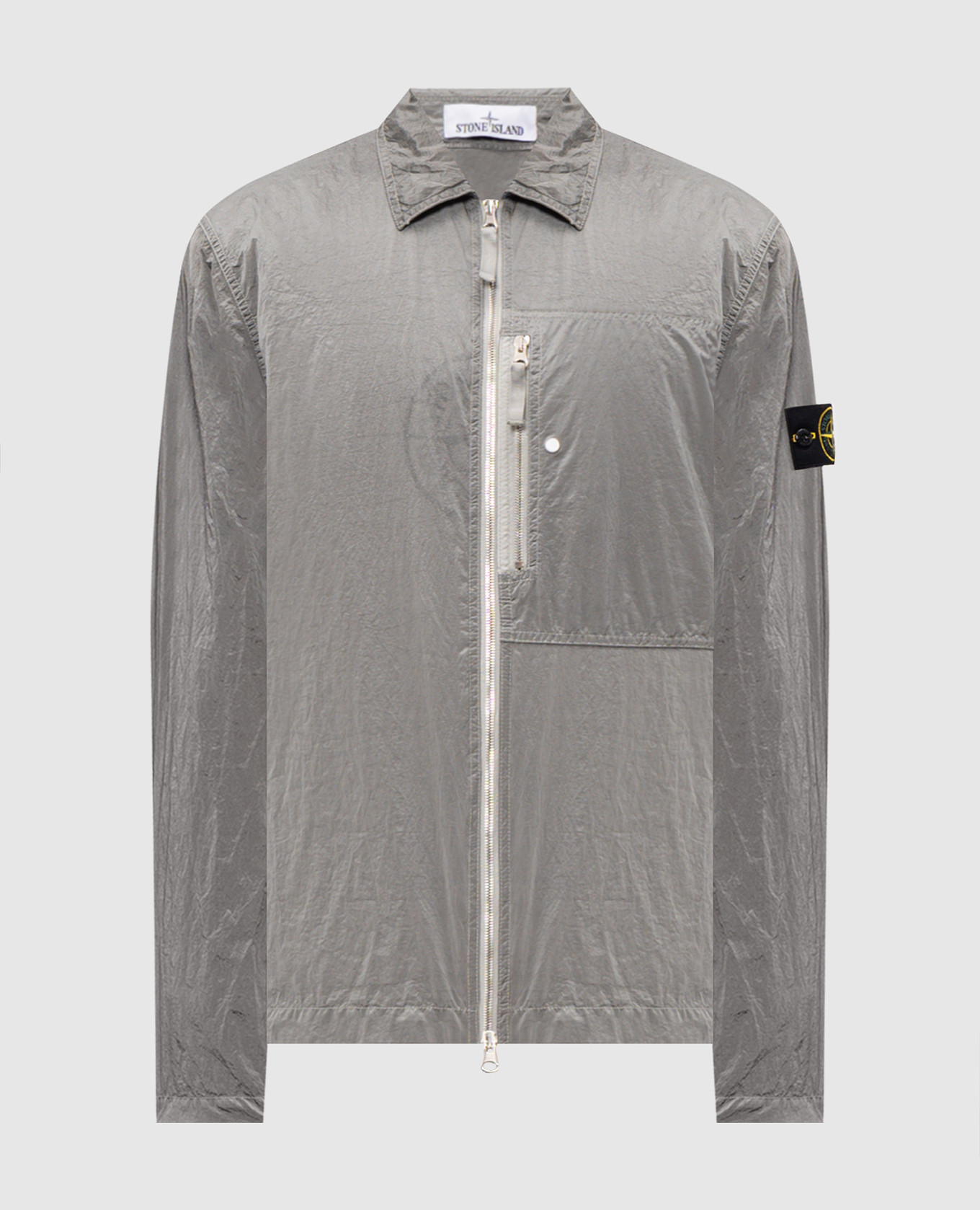 Khaki windbreaker with logo patch Stone Island
Khaki windbreaker with logo patch Stone Island