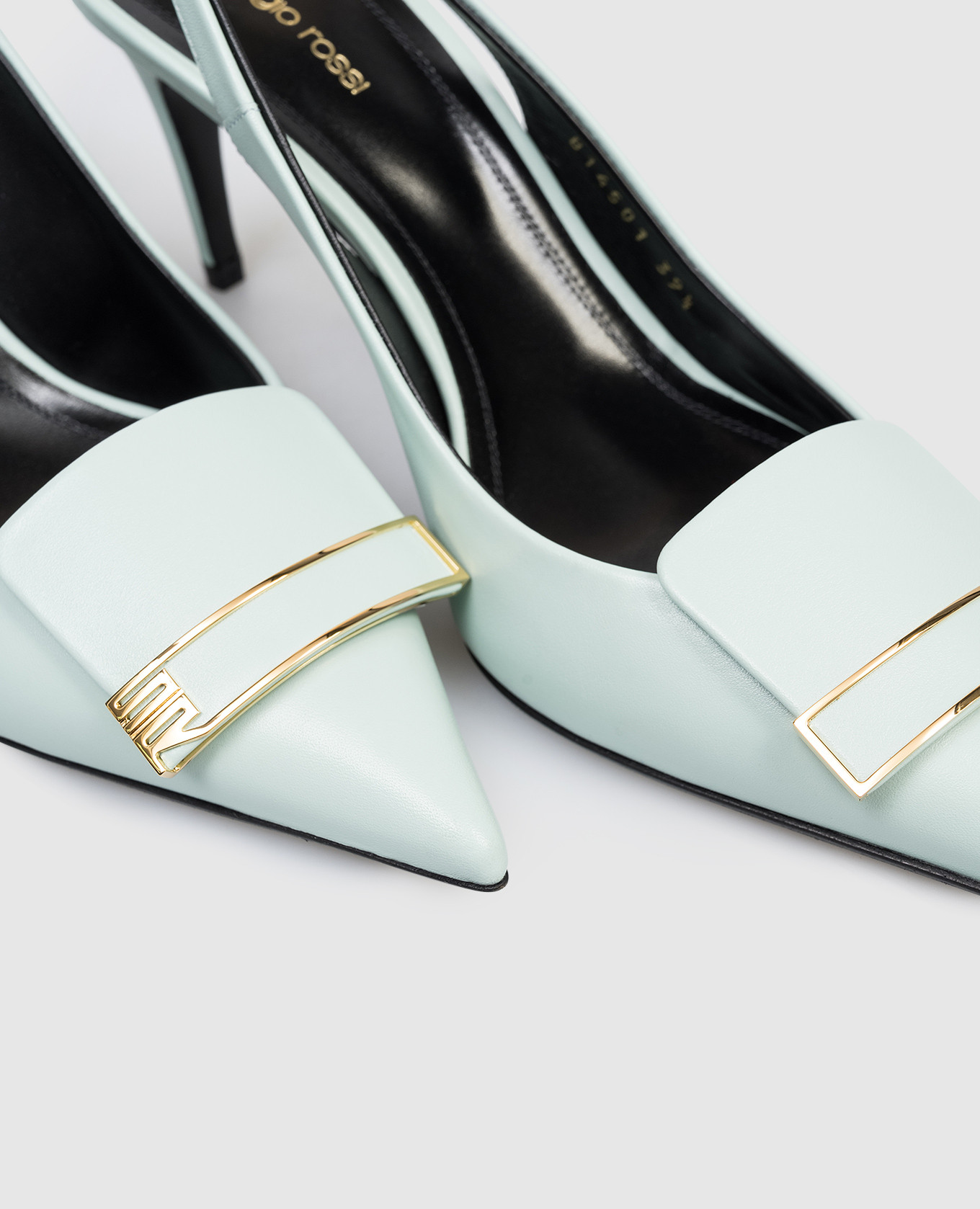 Green leather slingbacks with monogram Sergio Rossi
Green leather slingbacks with monogram Sergio Rossi