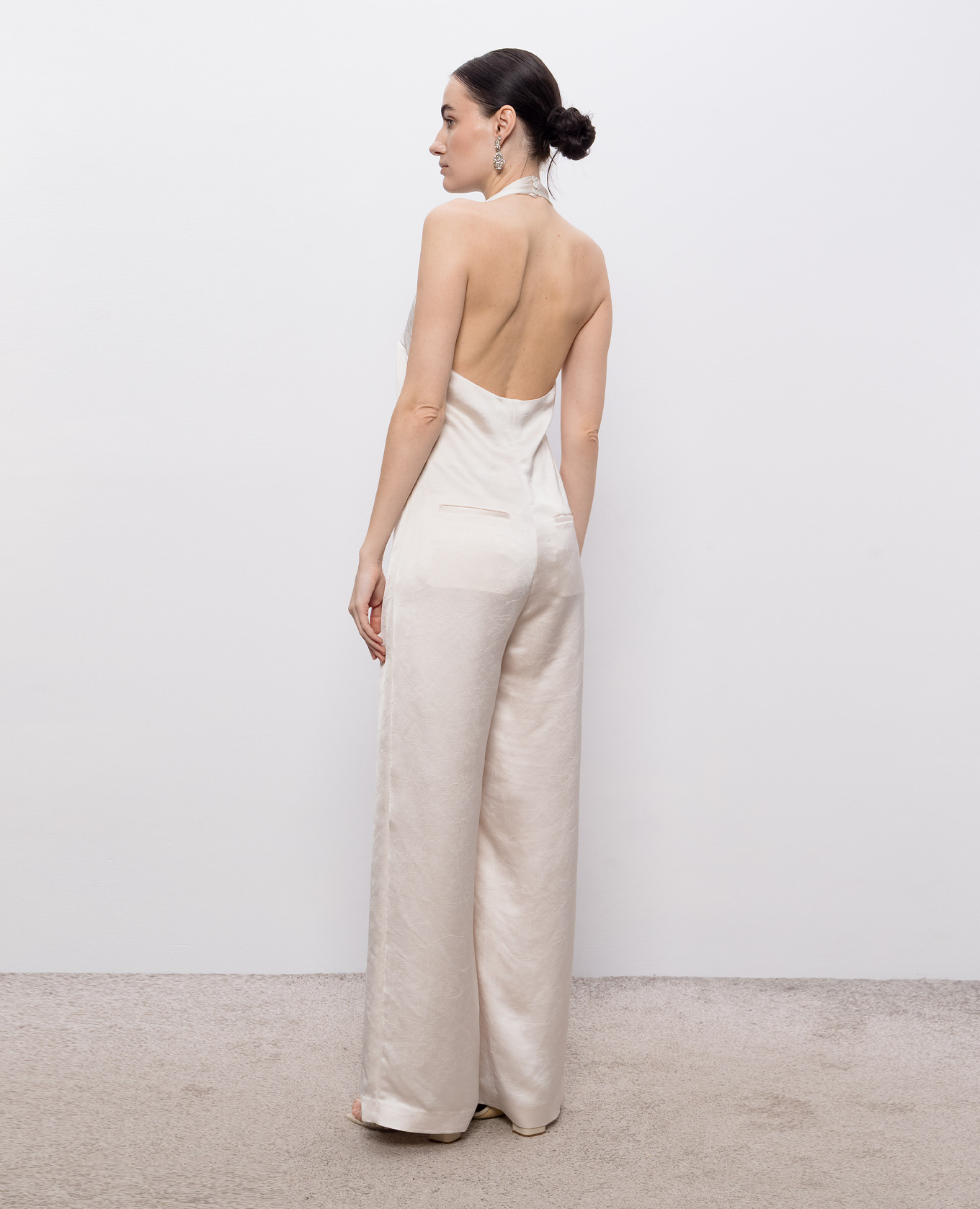 Beige jumpsuit with an open back Peserico
Beige jumpsuit with an open back Peserico