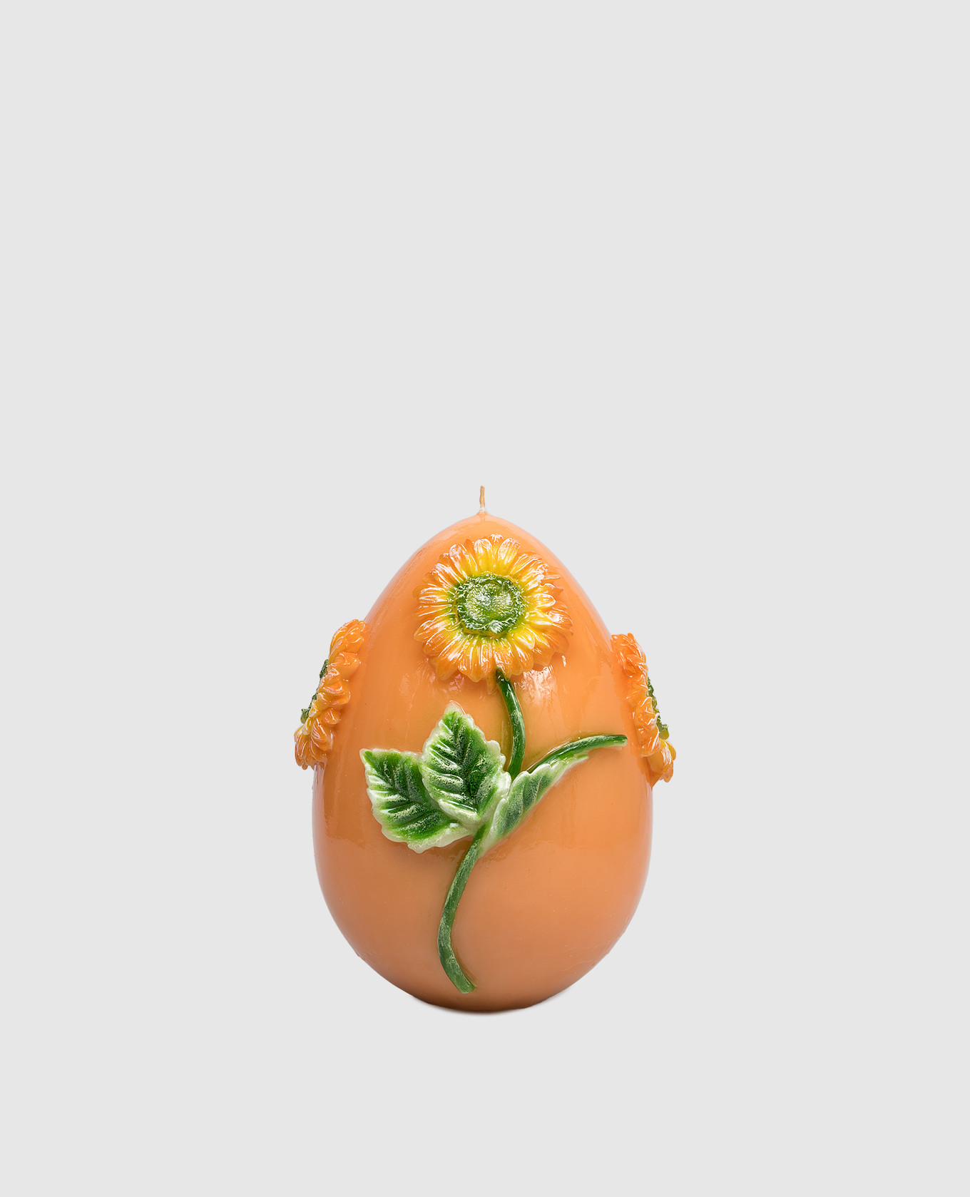 Orange egg-shaped candle with gerbera Cereria Introna
Orange egg-shaped candle with gerbera Cereria Introna