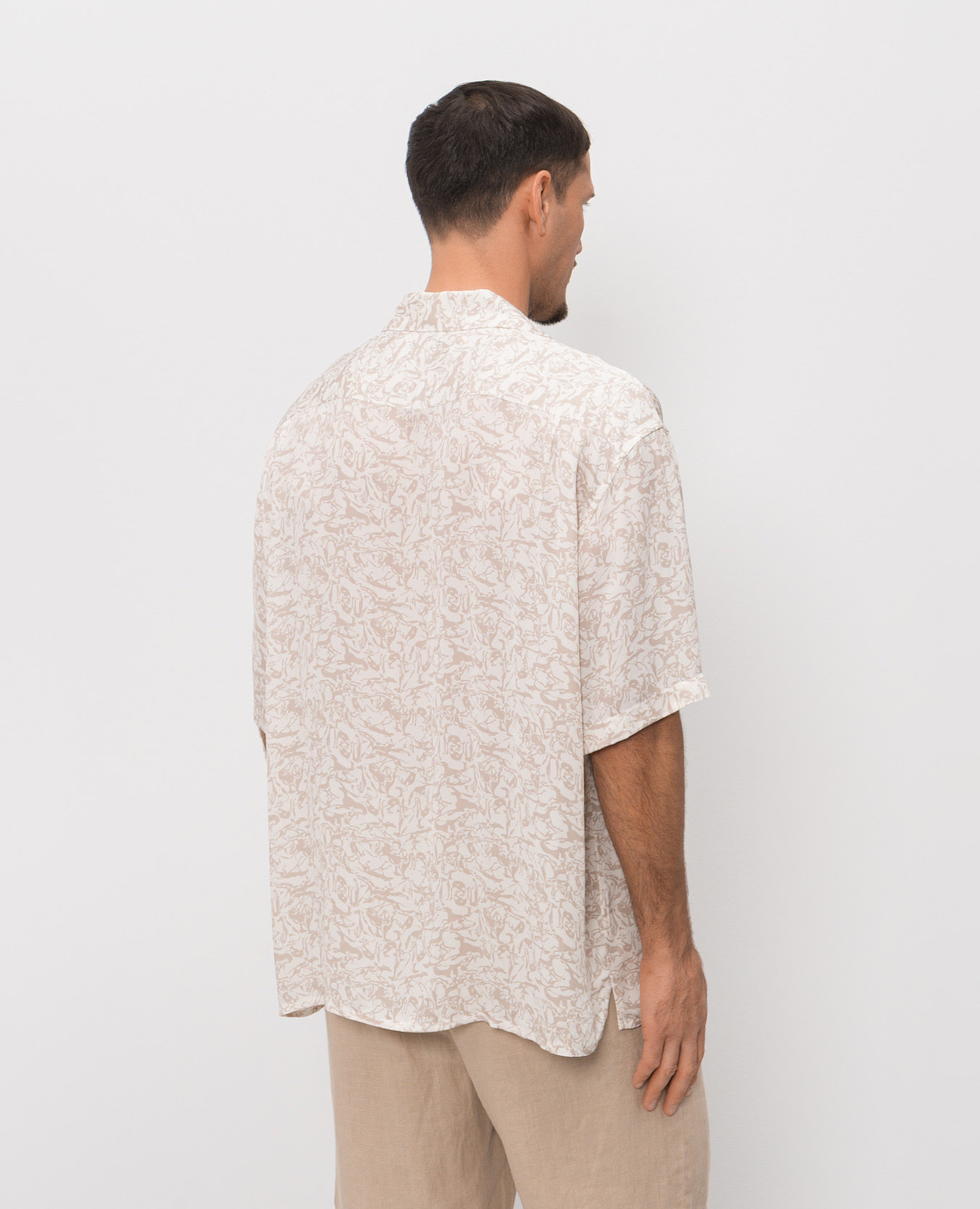 Beige shirt with branded print Trussardi
Beige shirt with branded print Trussardi
