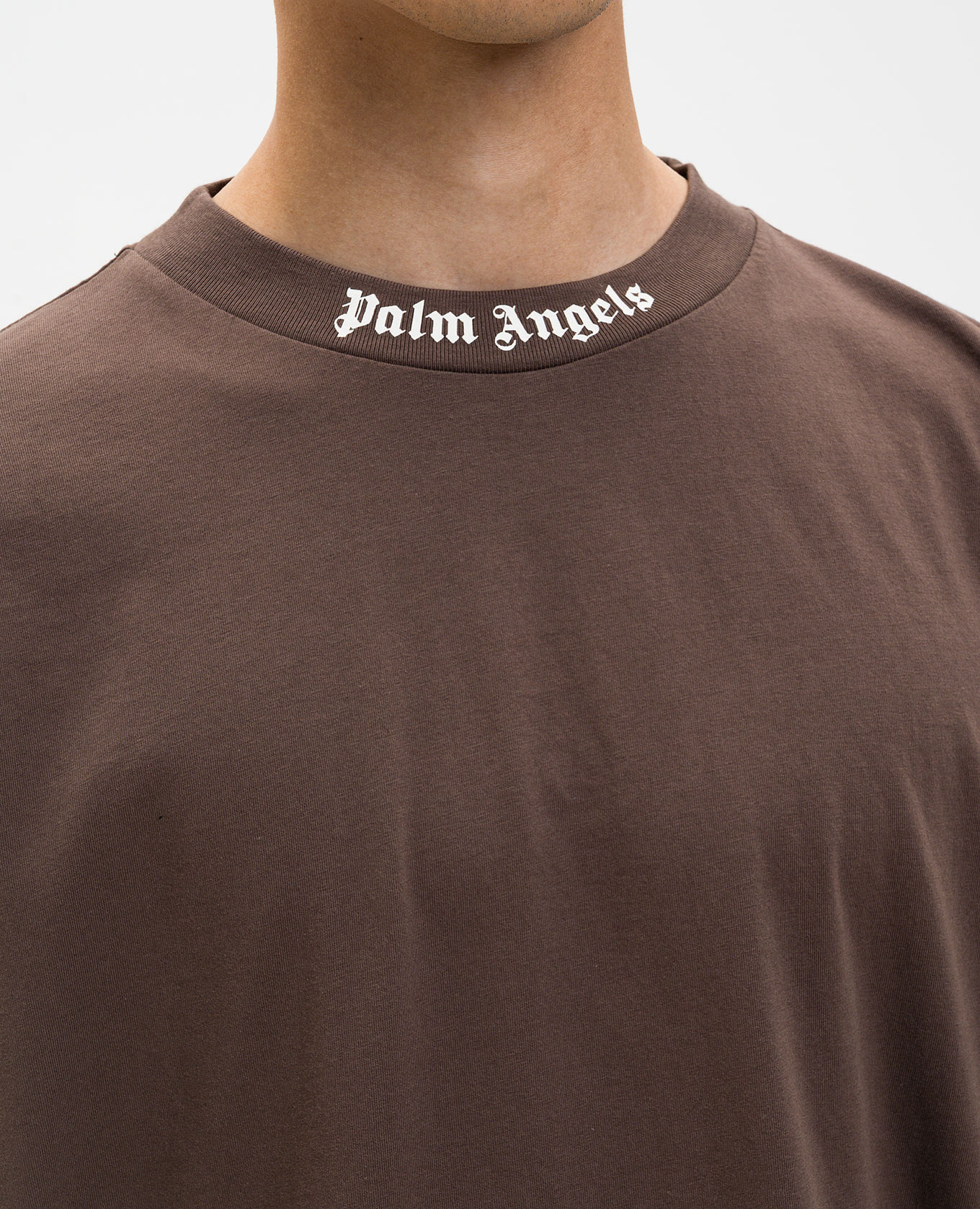 Brown T-shirt with contrast logo Palm Angels
Brown T-shirt with contrast logo Palm Angels