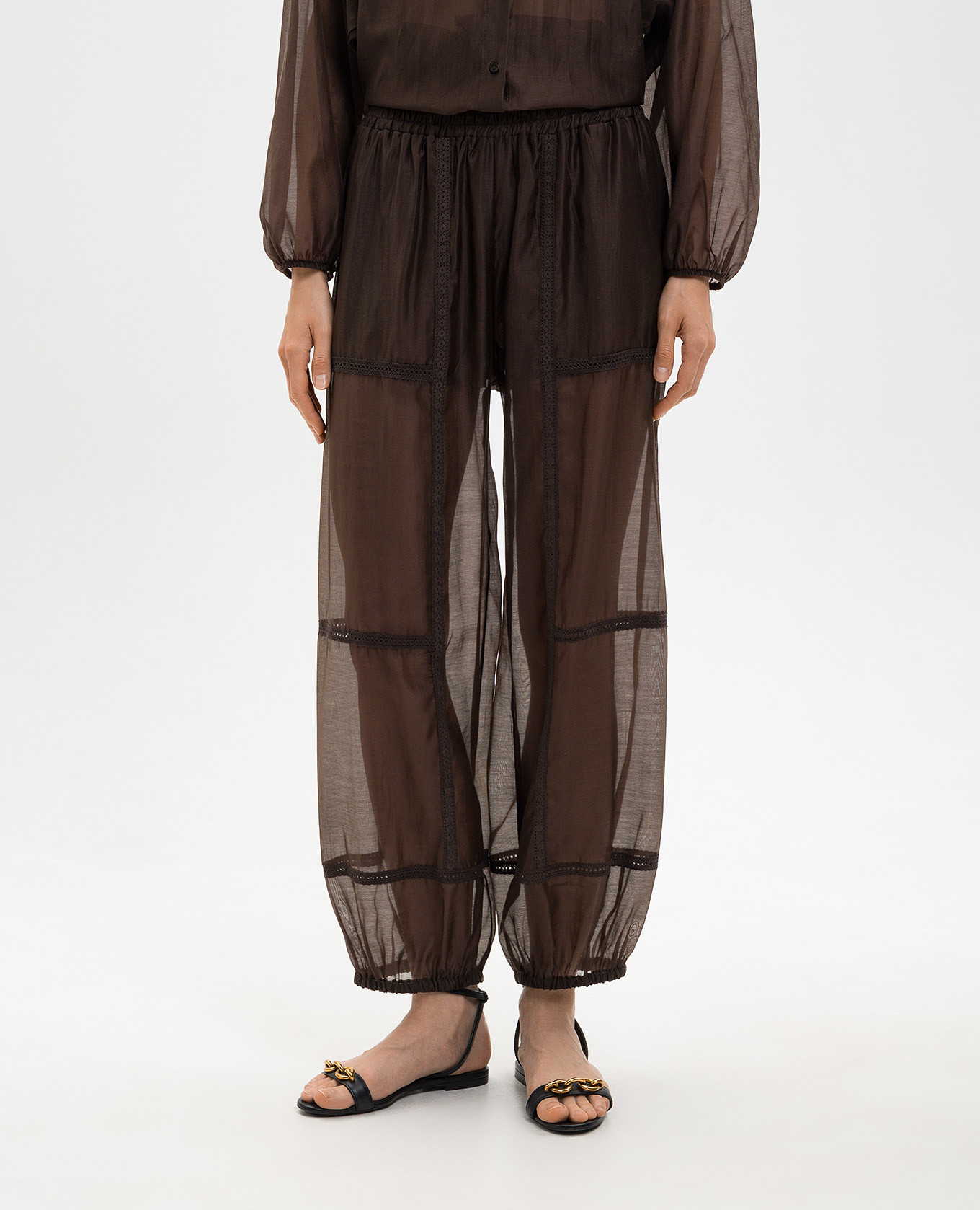 Brown joggers with lace Twinset
Brown joggers with lace Twinset