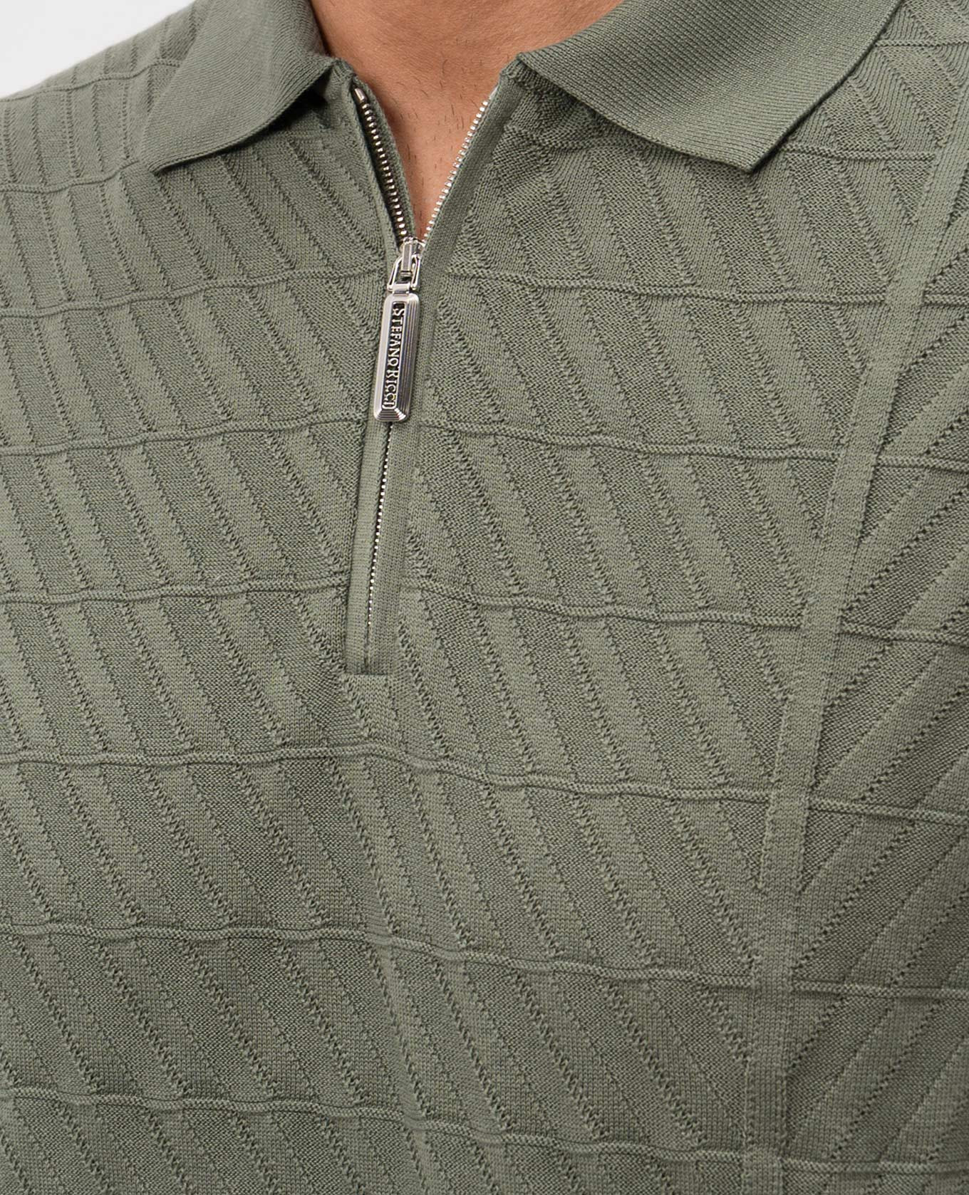 Green polo with pattern Stefano Ricci
Green polo with pattern Stefano Ricci