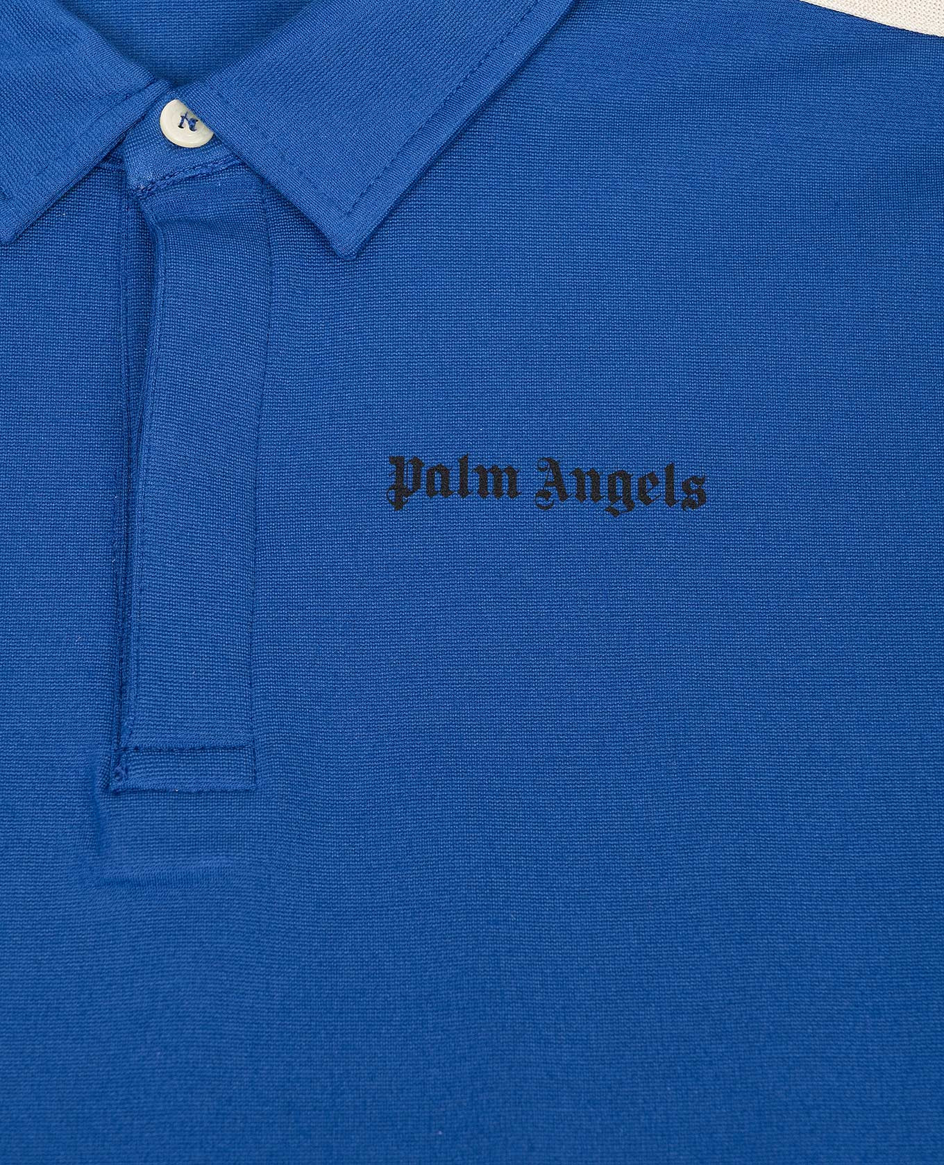 Children's blue polo with ribbon Palm Angels
Children's blue polo with ribbon Palm Angels