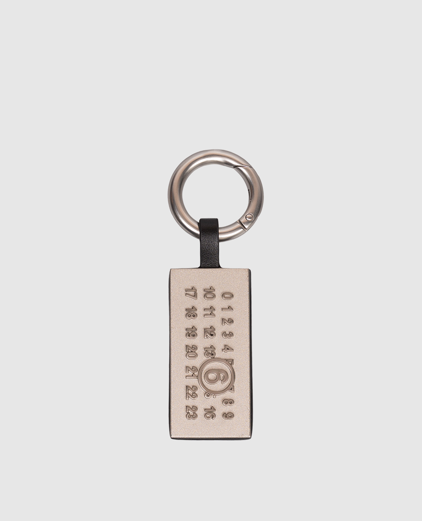 Black leather bag keychain with logo plate Maison Margiela MM6
Black leather bag keychain with logo plate Maison Margiela MM6