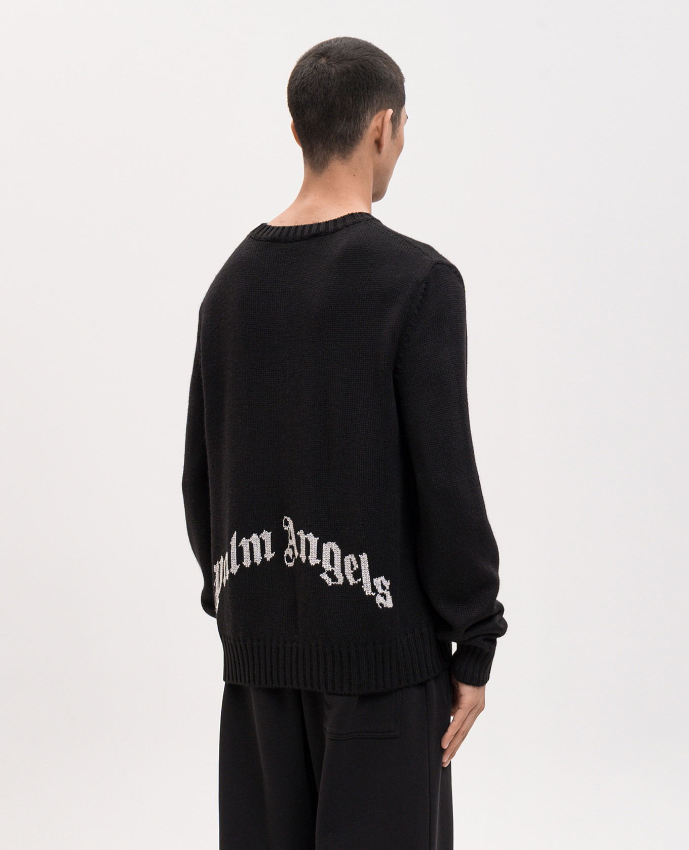 Black wool sweater with logo pattern Palm Angels
Black wool sweater with logo pattern Palm Angels