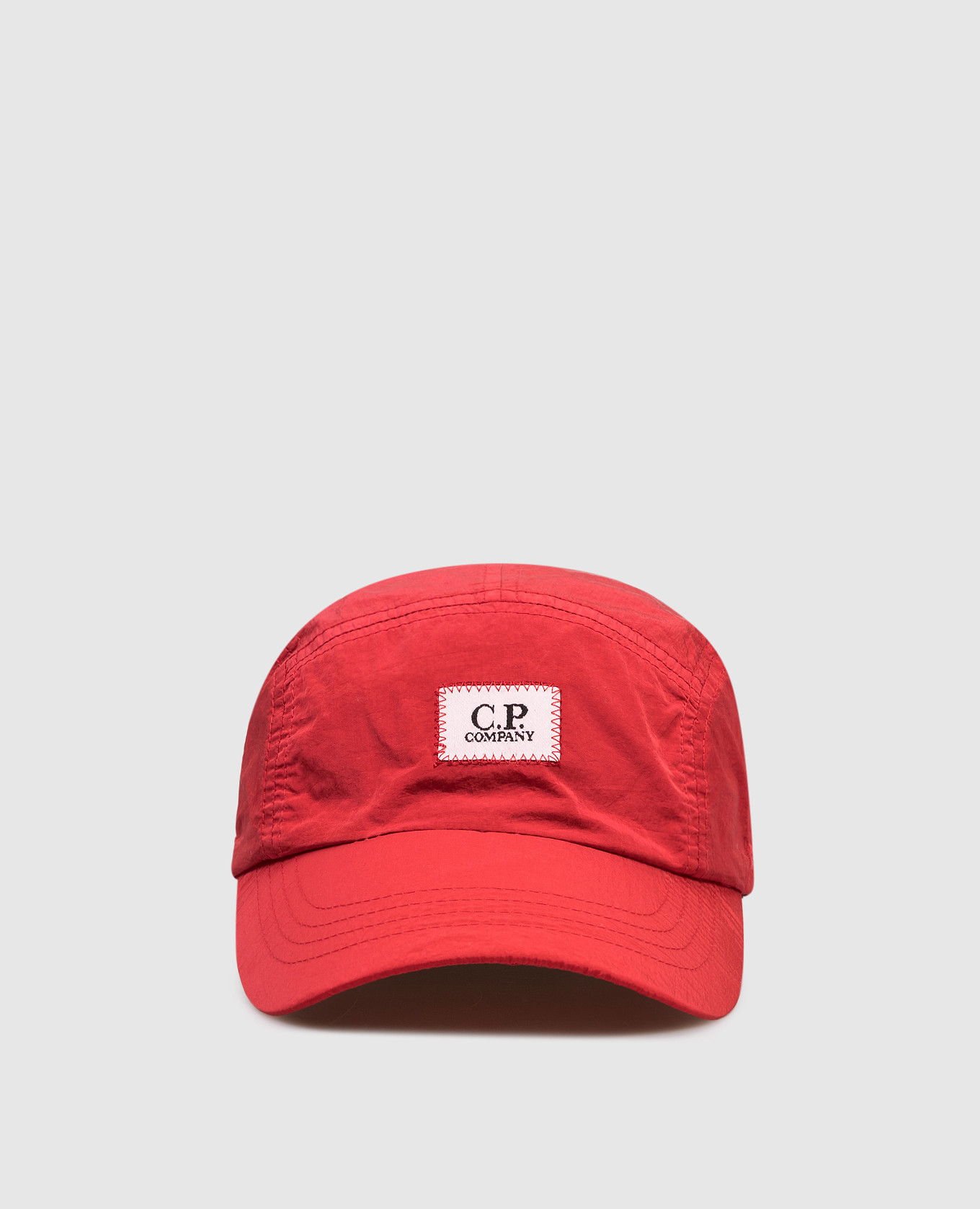 Children's red cap with logo patch C.P. Company
Children's red cap with logo patch C.P. Company