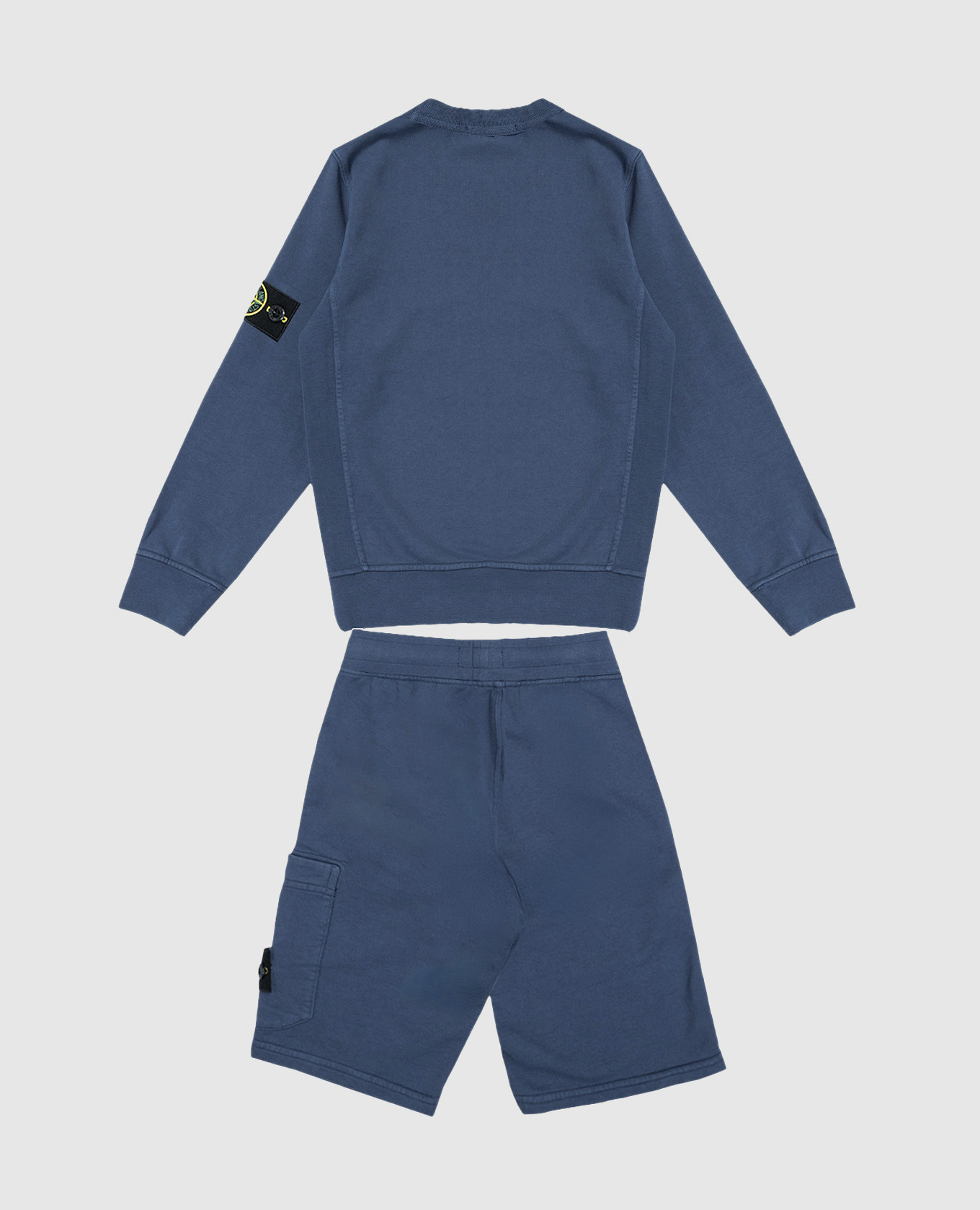 Children's blue sweatshirt and shorts suit Stone Island
Children's blue sweatshirt and shorts suit Stone Island