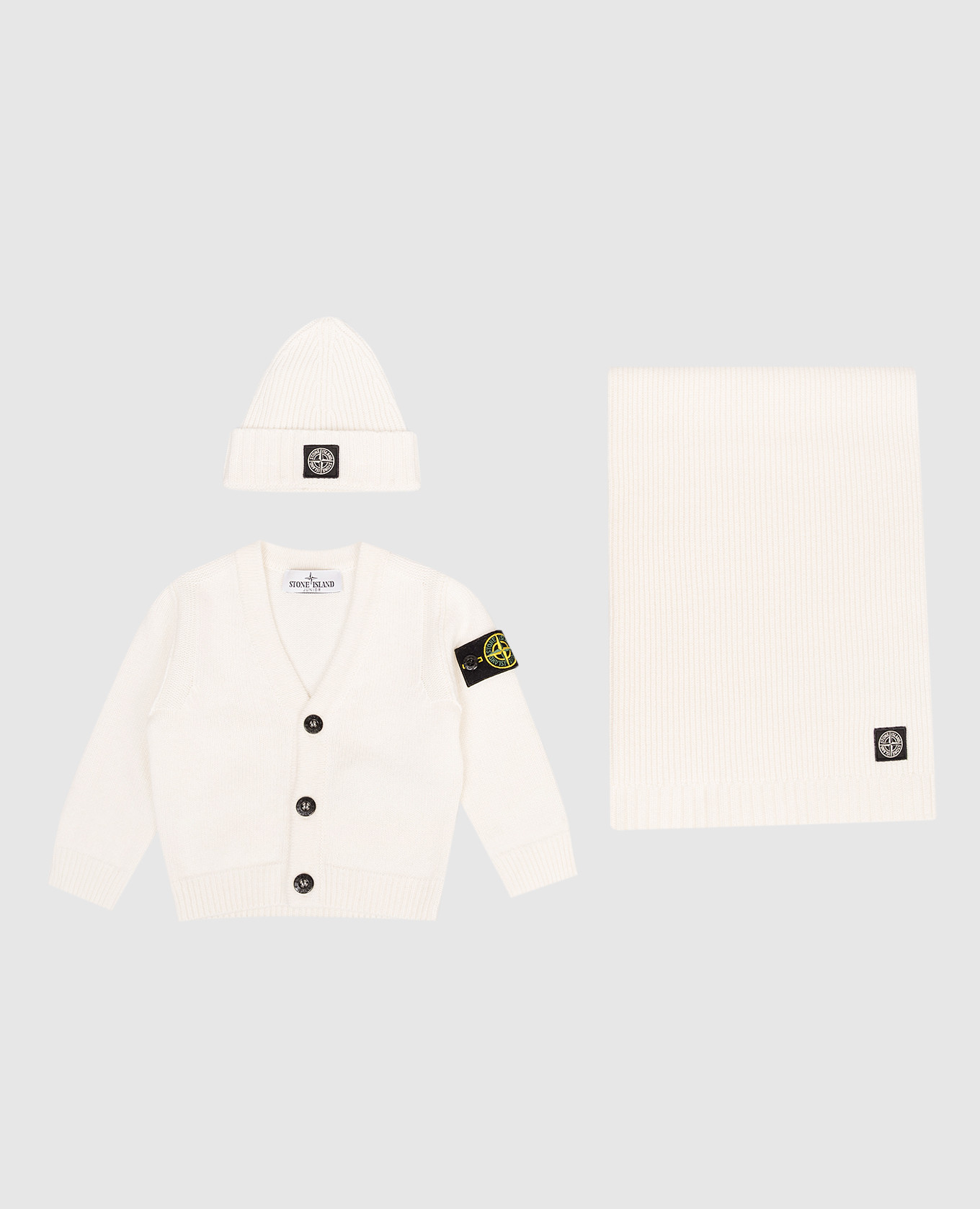 Children's set of a white cardigan, plaid and hat with a logo Stone Island
Children's set of a white cardigan, plaid and hat with a logo Stone Island