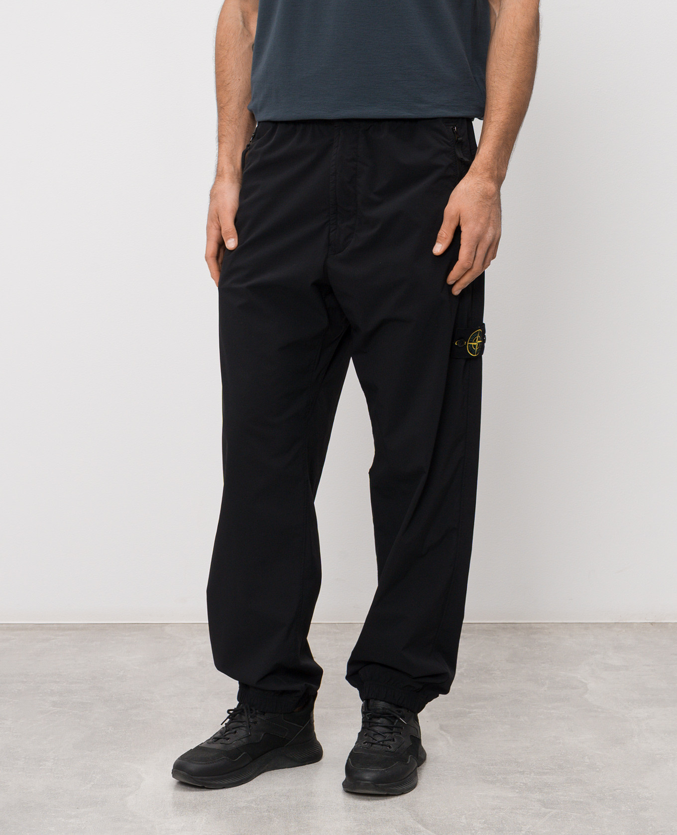 Black joggers with logo patch Stone Island
Black joggers with logo patch Stone Island