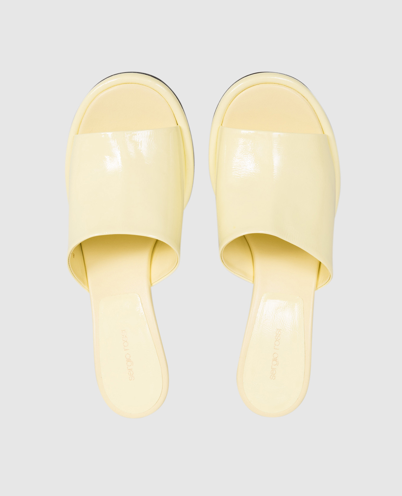 Orb Yellow Patent Leather Mules Sergio Rossi
Orb Yellow Patent Leather Mules Sergio Rossi