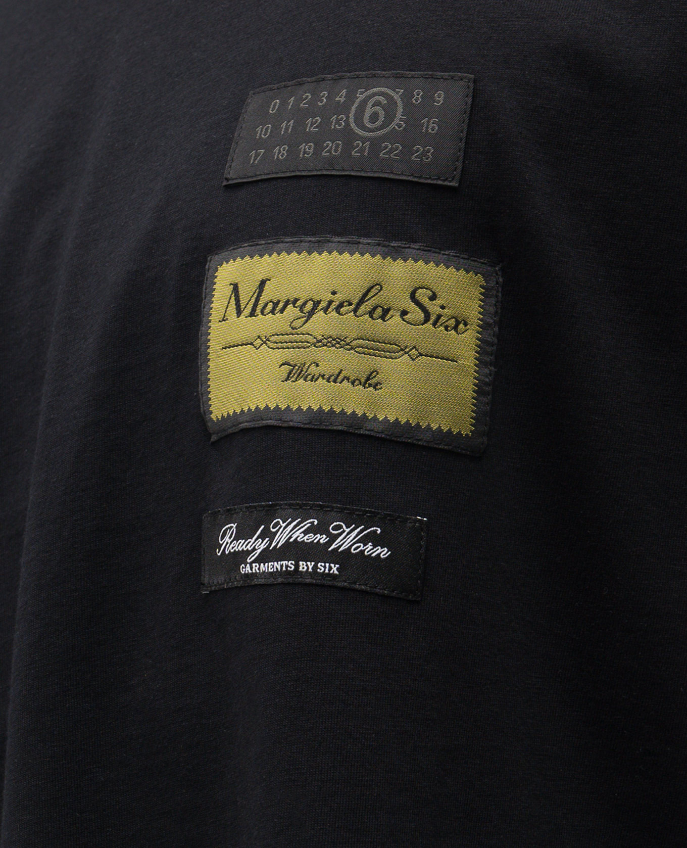 Black T-shirt with branded patches Maison Margiela MM6
Black T-shirt with branded patches Maison Margiela MM6