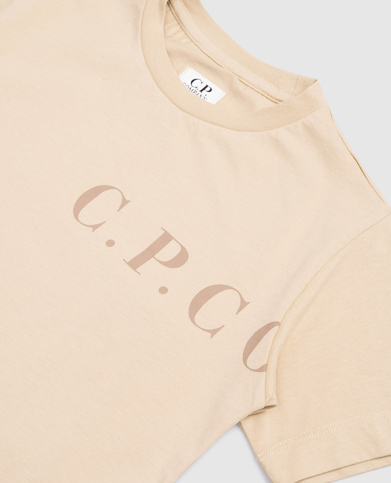 Children's beige T-shirt with logo C.P. Company
Children's beige T-shirt with logo C.P. Company