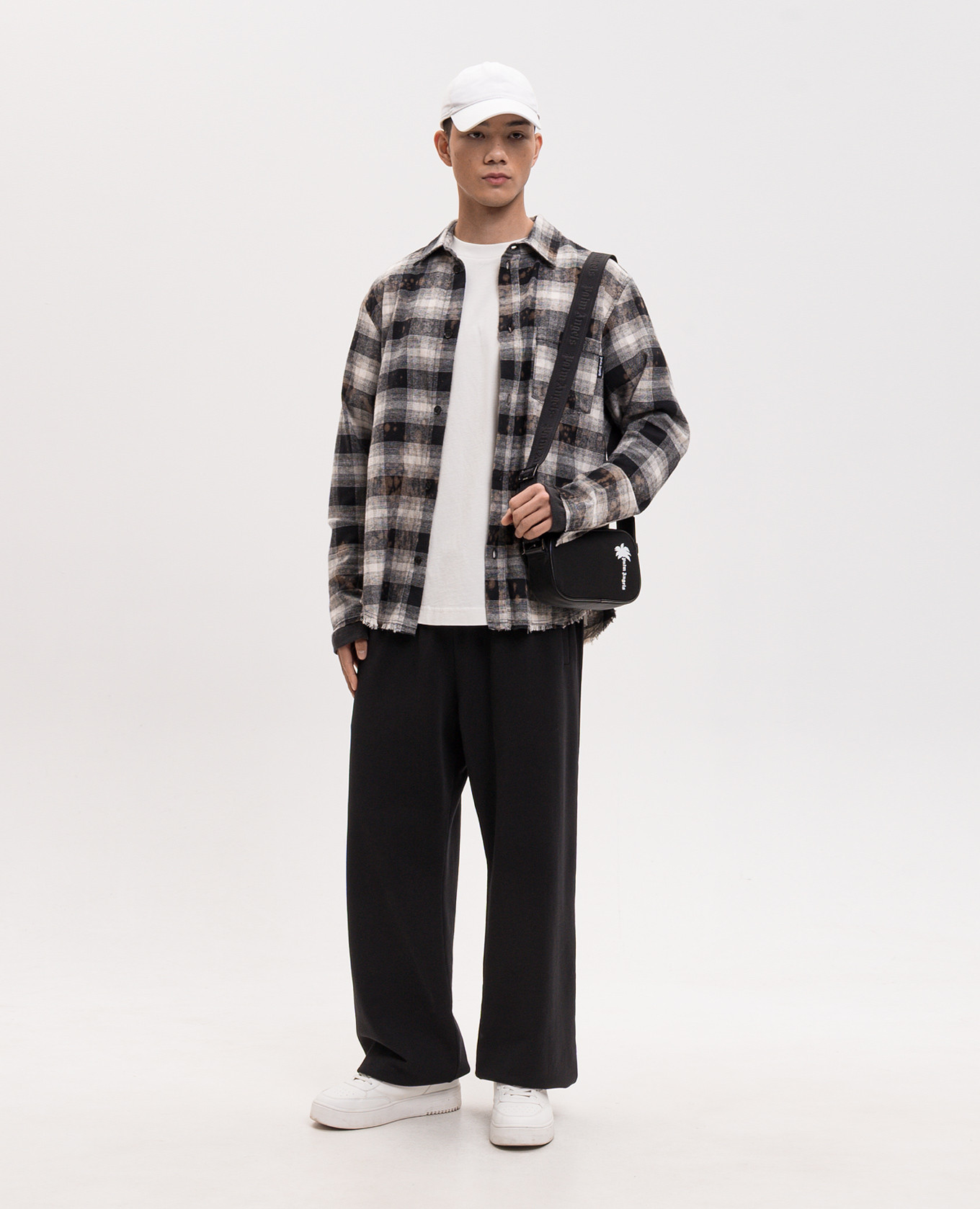 Beige checked shirt with logo print Palm Angels
Beige checked shirt with logo print Palm Angels