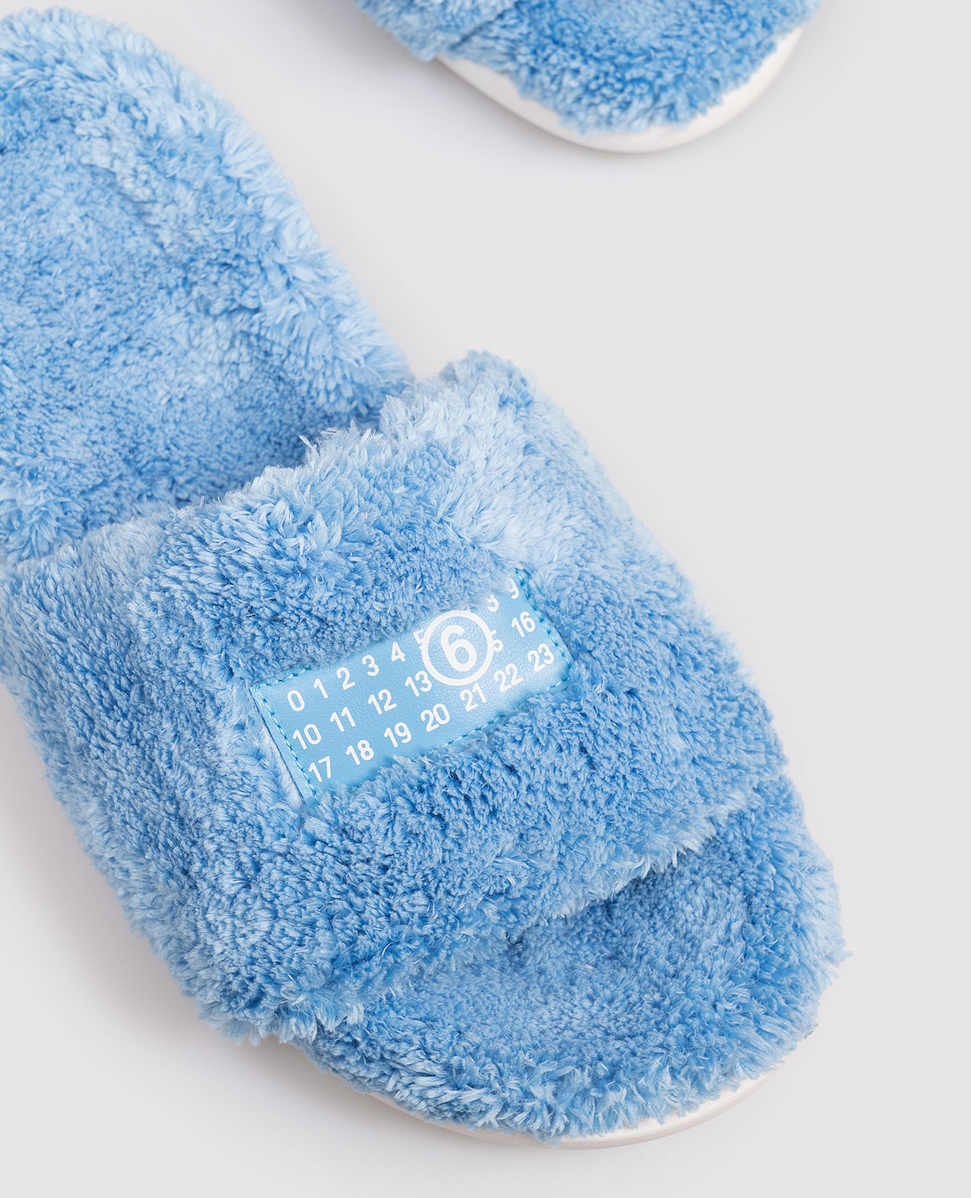 Children's blue flip-flops with logo Maison Margiela MM6, Light blue
Children's blue flip-flops with logo Maison Margiela MM6, Light blue