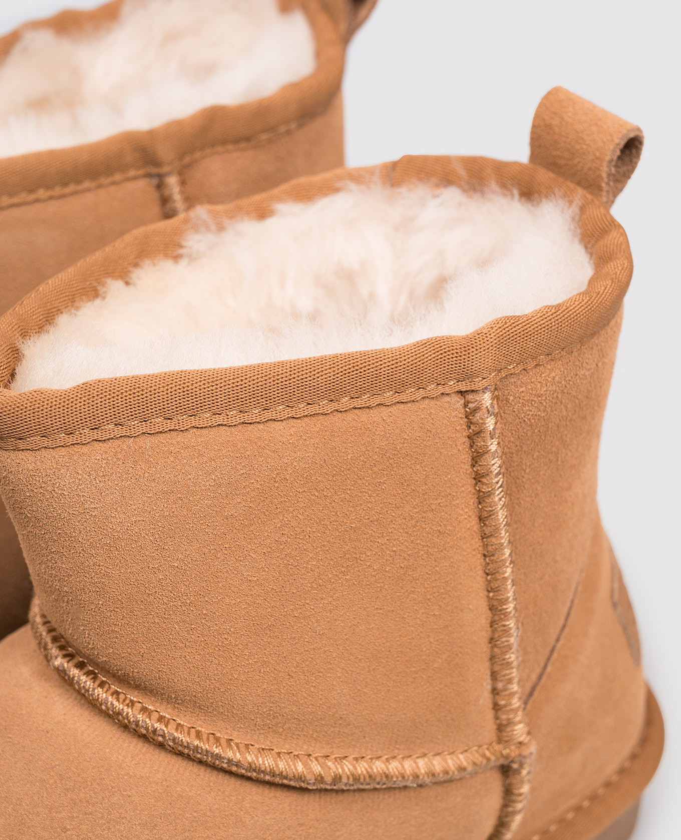 

Brown suede boots with fur trim Colors of California