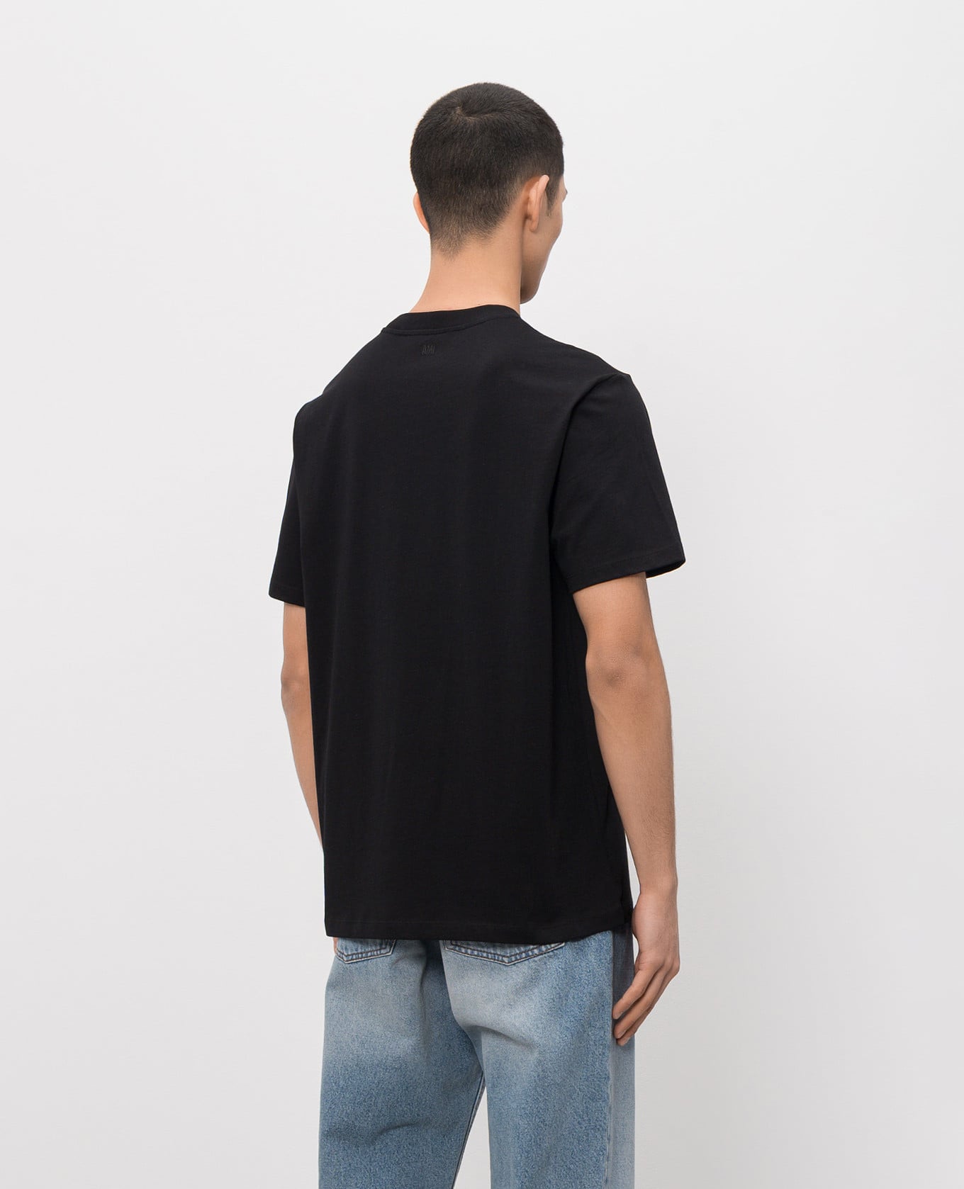 

Black T-shirt with embroidered emblem Ami Paris