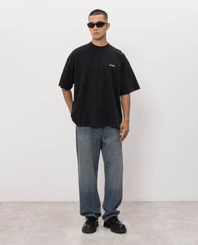 Vetements Black T-shirt with contrast logo print MH27TR144B