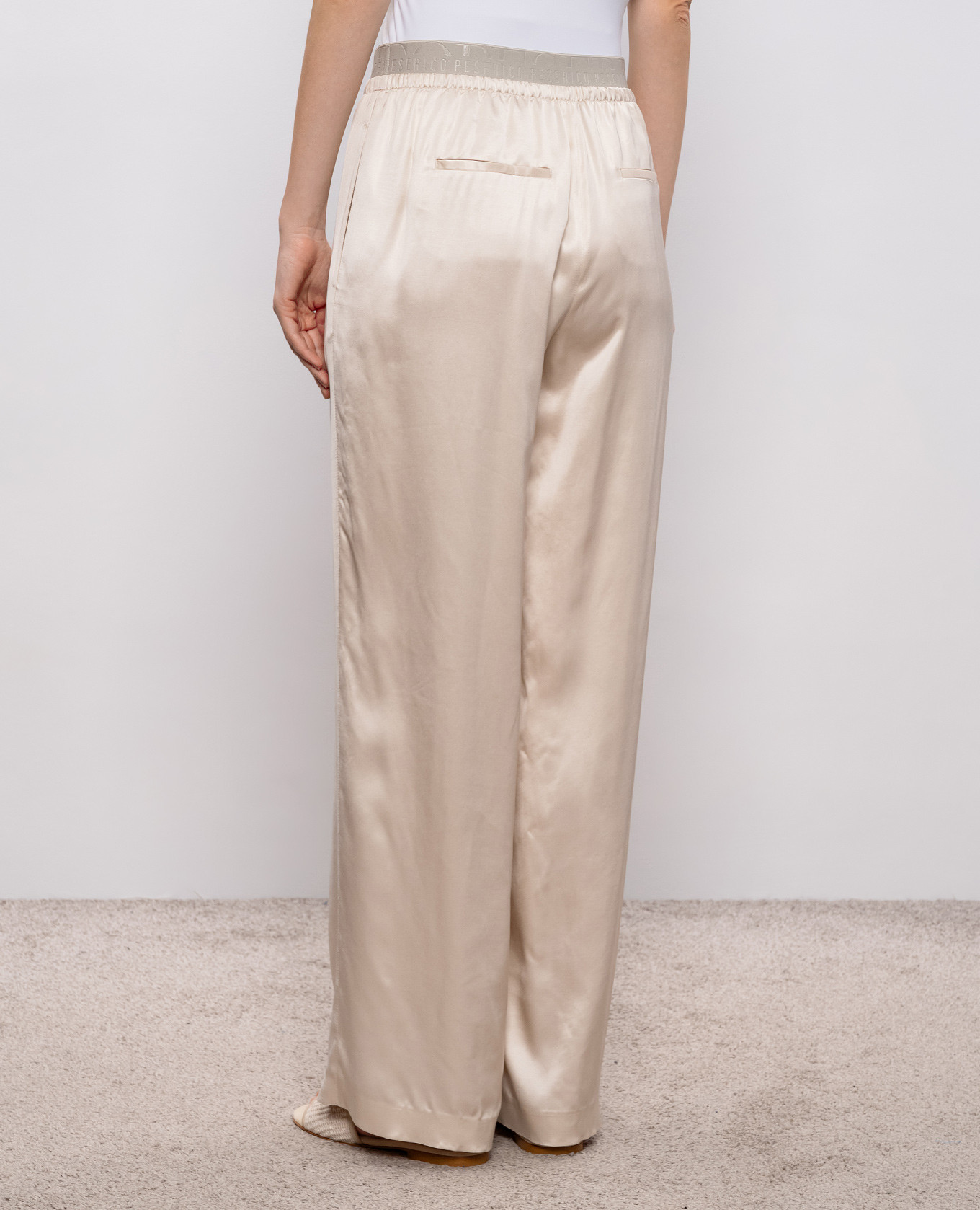 

Beige pants with logo Peserico