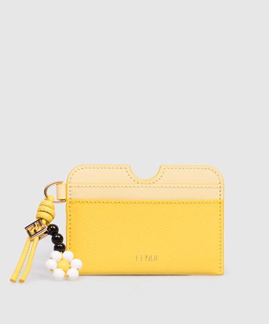 Yellow leather cardholder with pendant