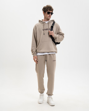 Off-White Beige joggers with logo print 44MCH057S26F001
