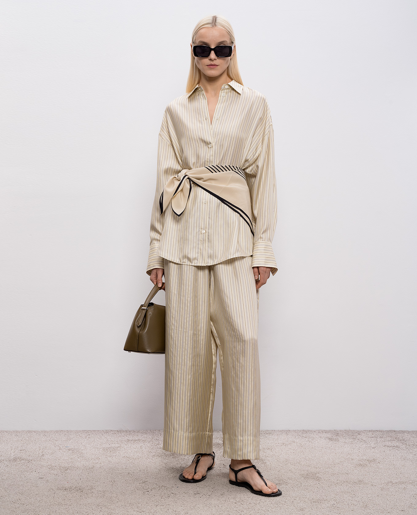 

Beige striped silk pants Toteme