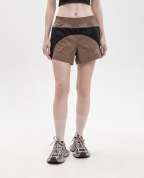 Balenciaga Brown shorts with logo print A002BCTUO41