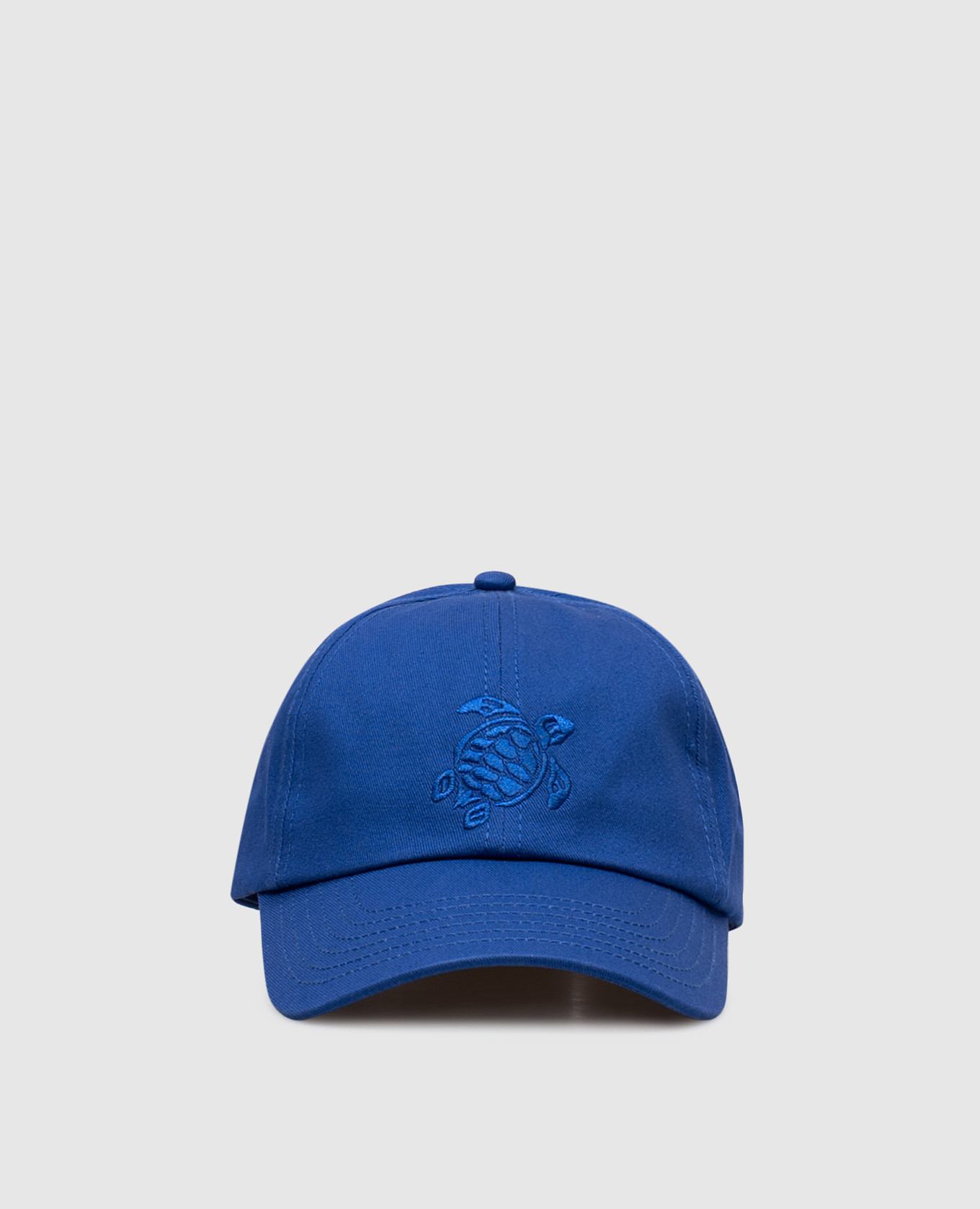 Blue cap with emblem