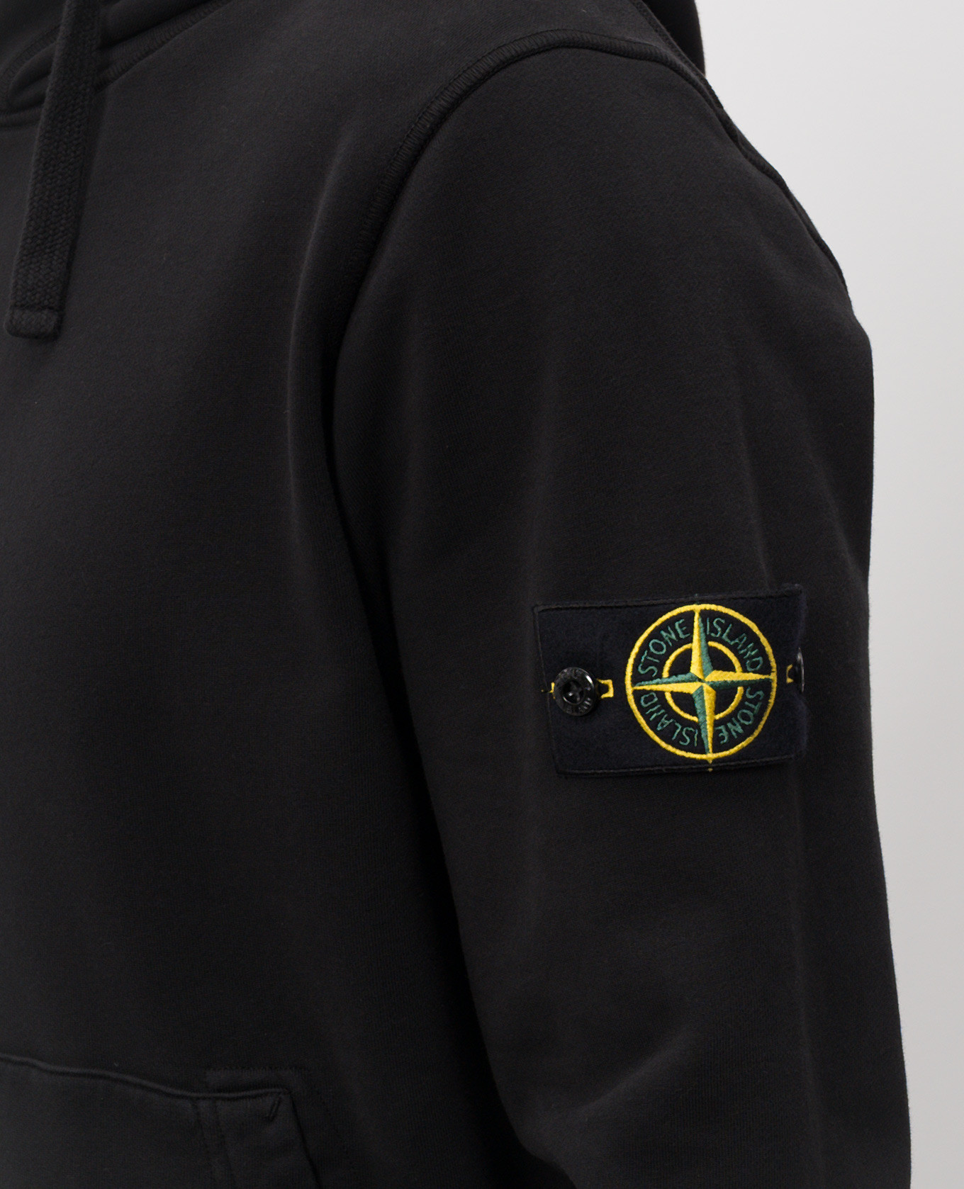

Black hoodie with logo patch Stone Island