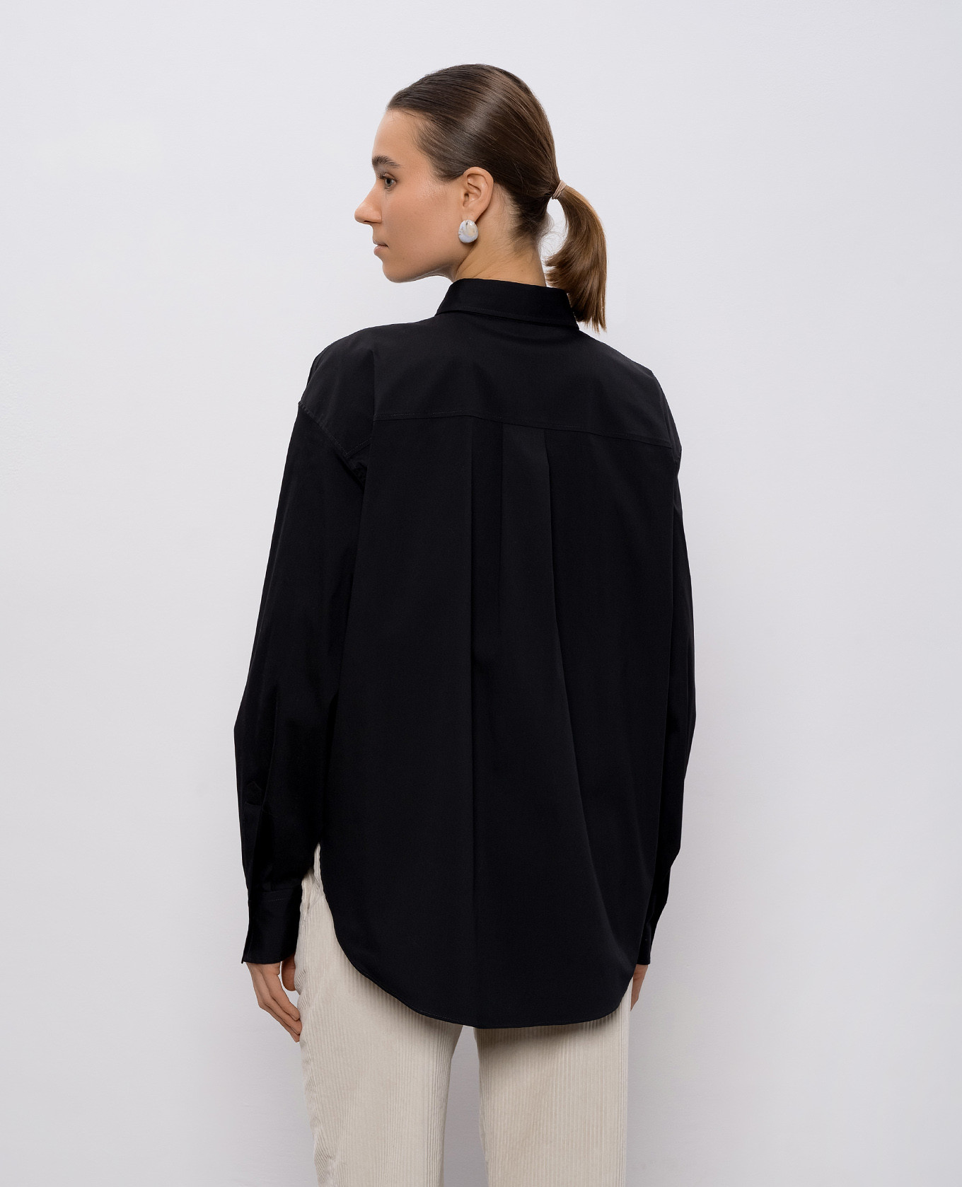 

Black shirt with monil chain Brunello Cucinelli