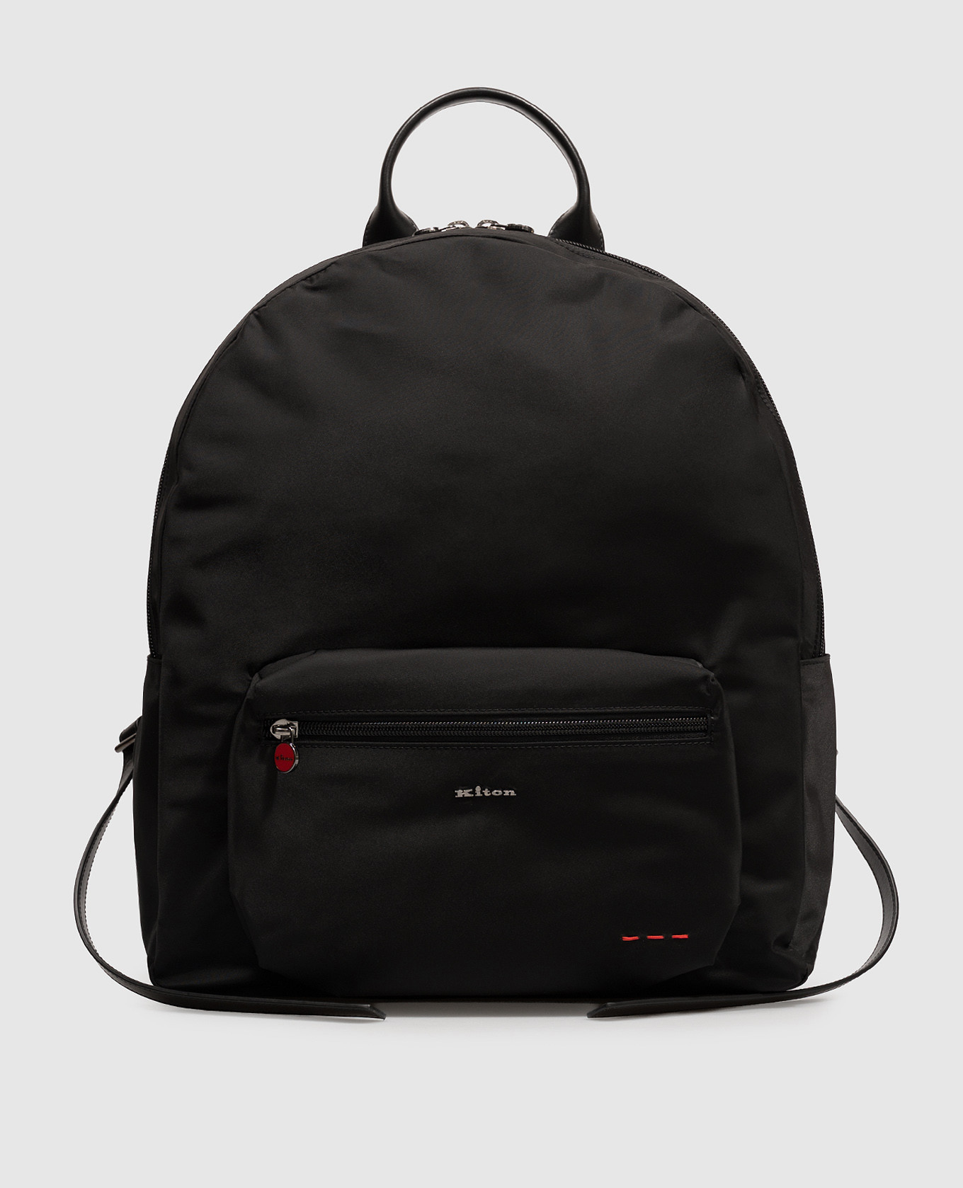 Black backpack with metal logo